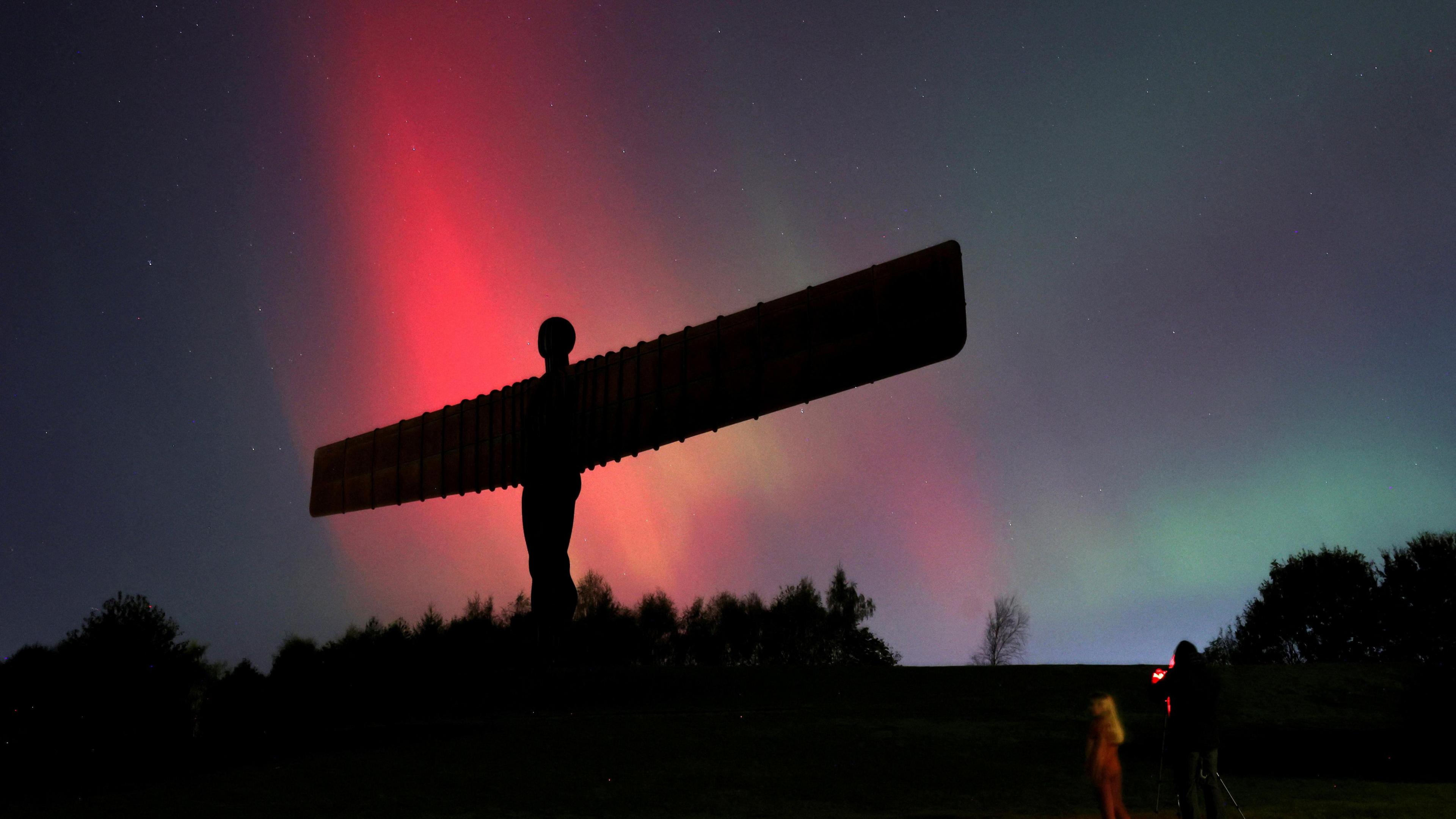 Northern Lights, also known as aurora borealis, are seen at the Angel of the North in Gateshead.