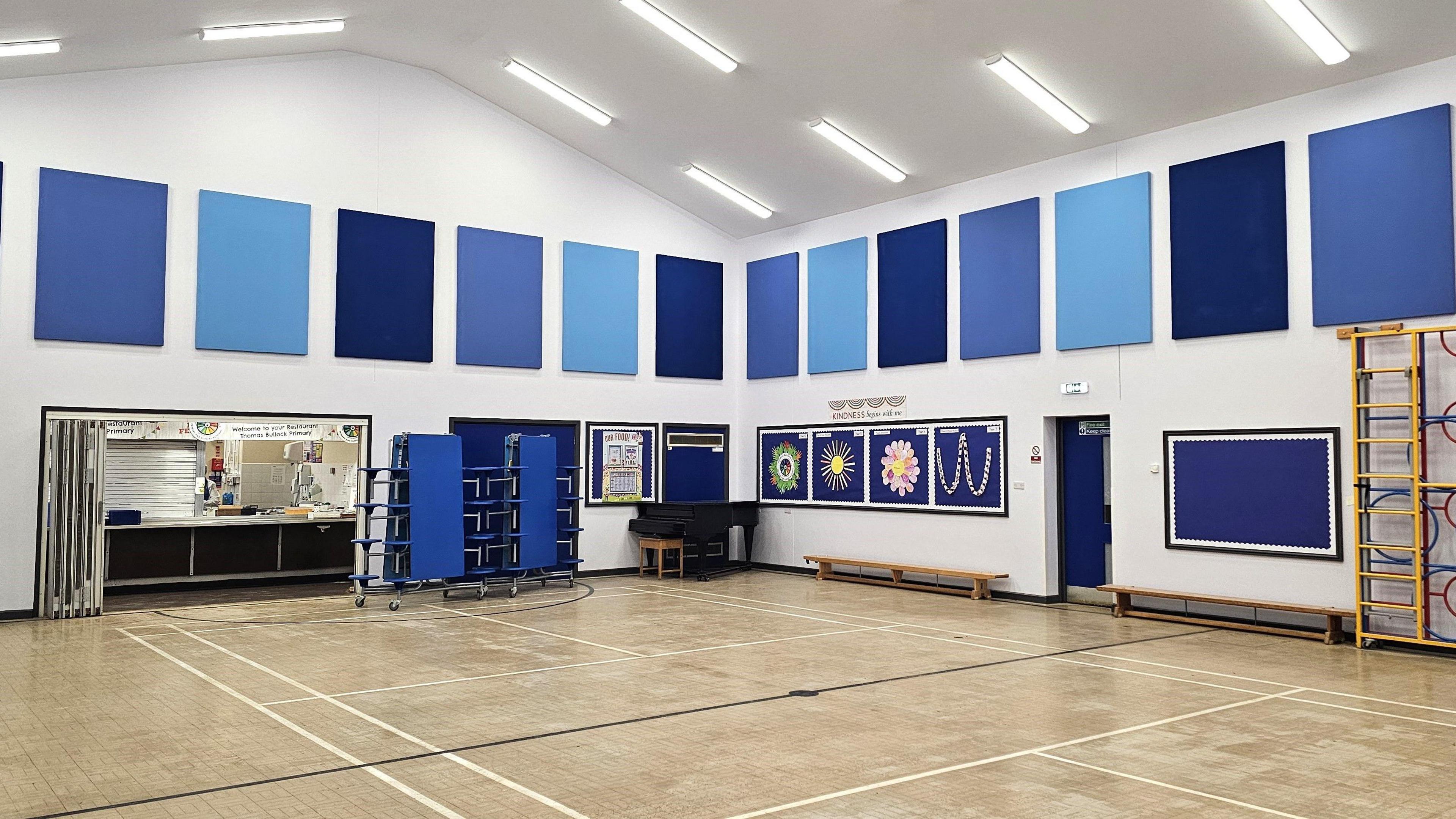 School hall with serving hatch and folded tables