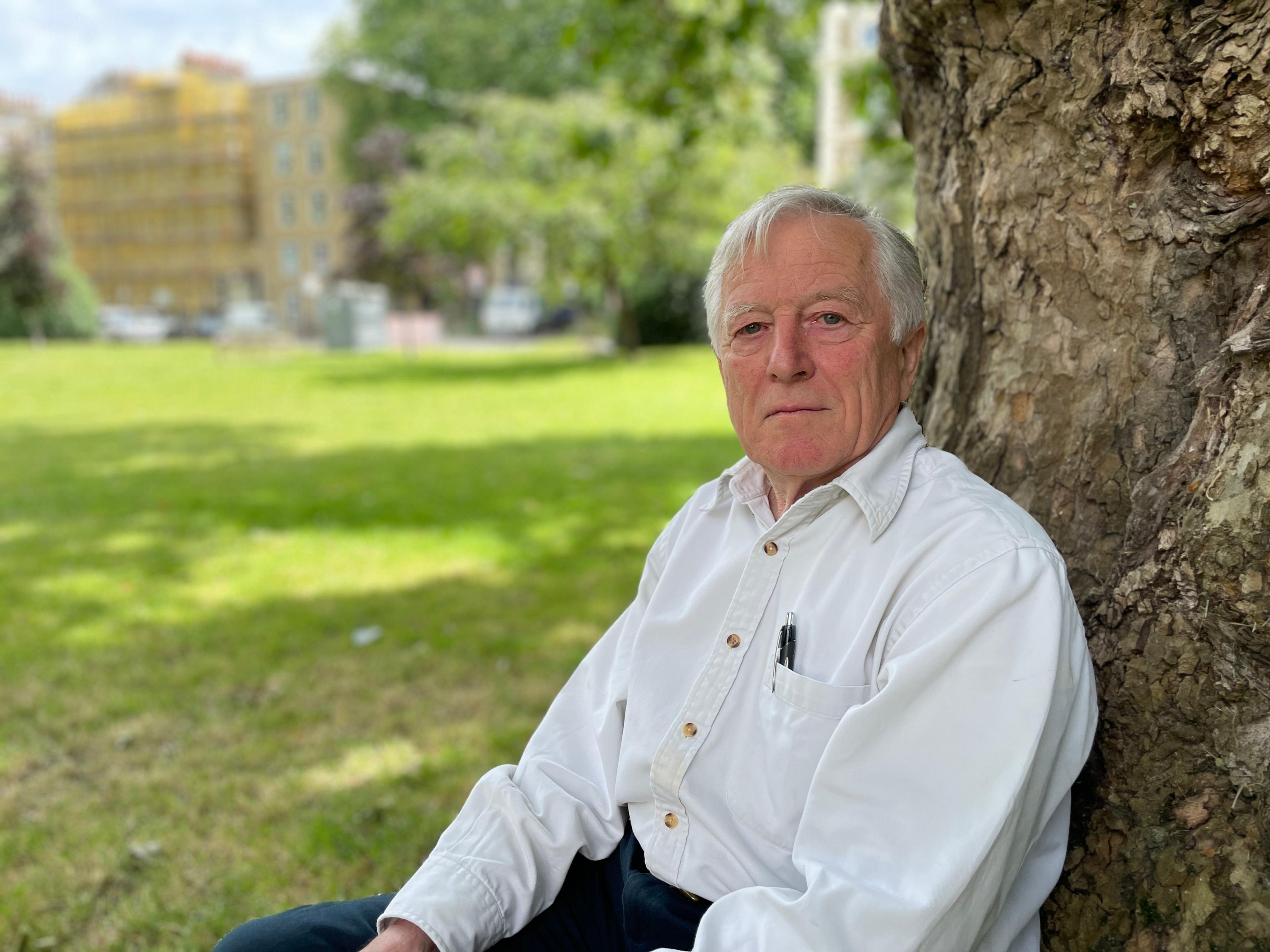 Man sitting in a garden 