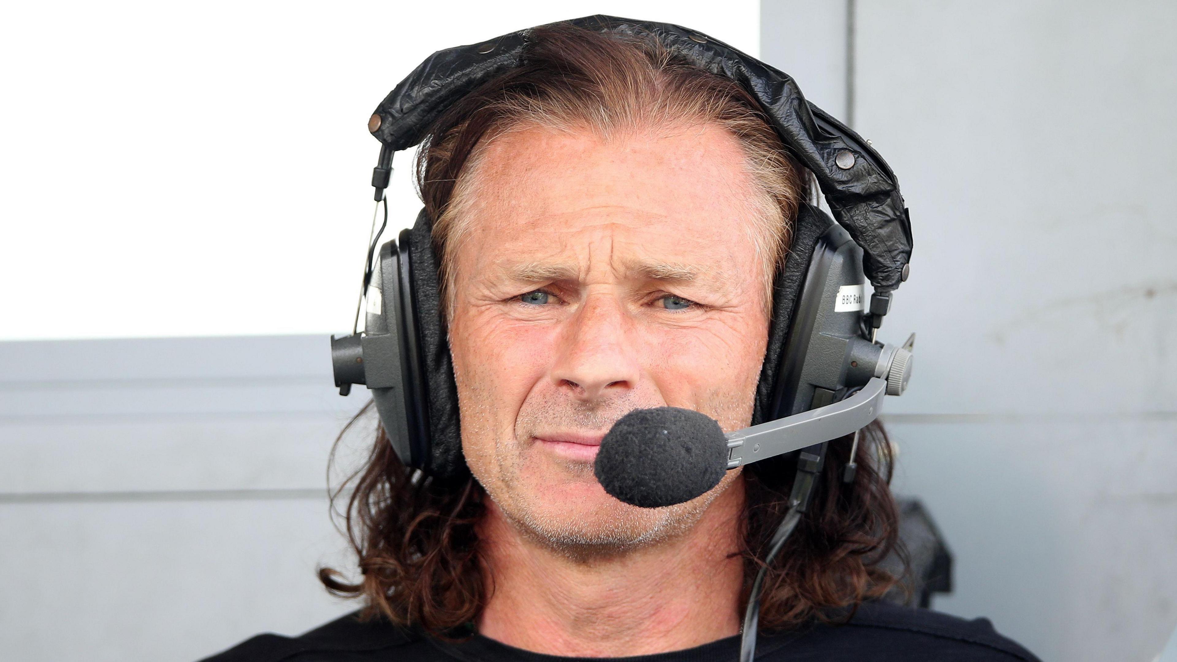 Gareth Ainsworth while on commentary duty for BBC 5 Live