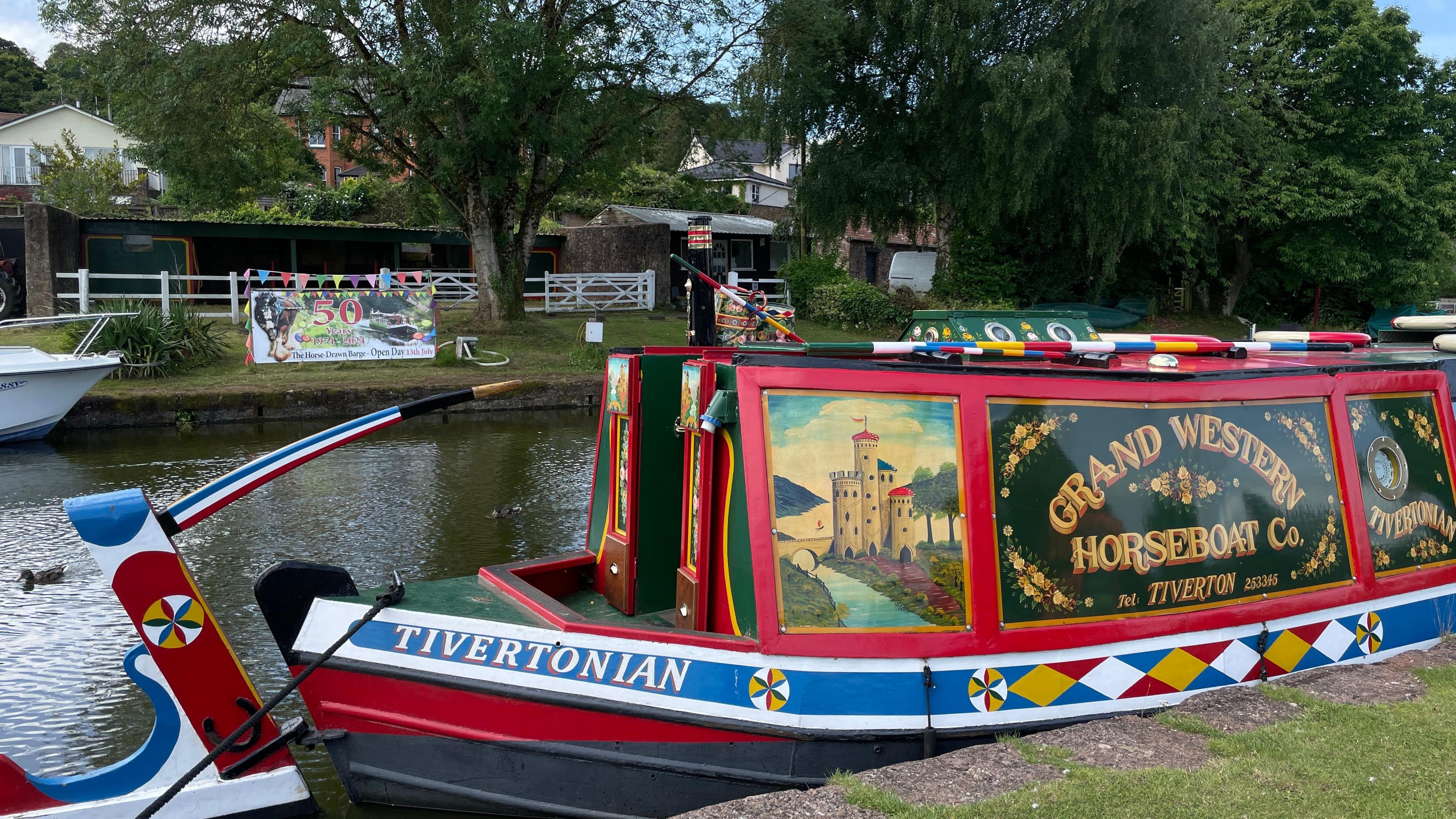 A traditional barge painted with roses and castles.