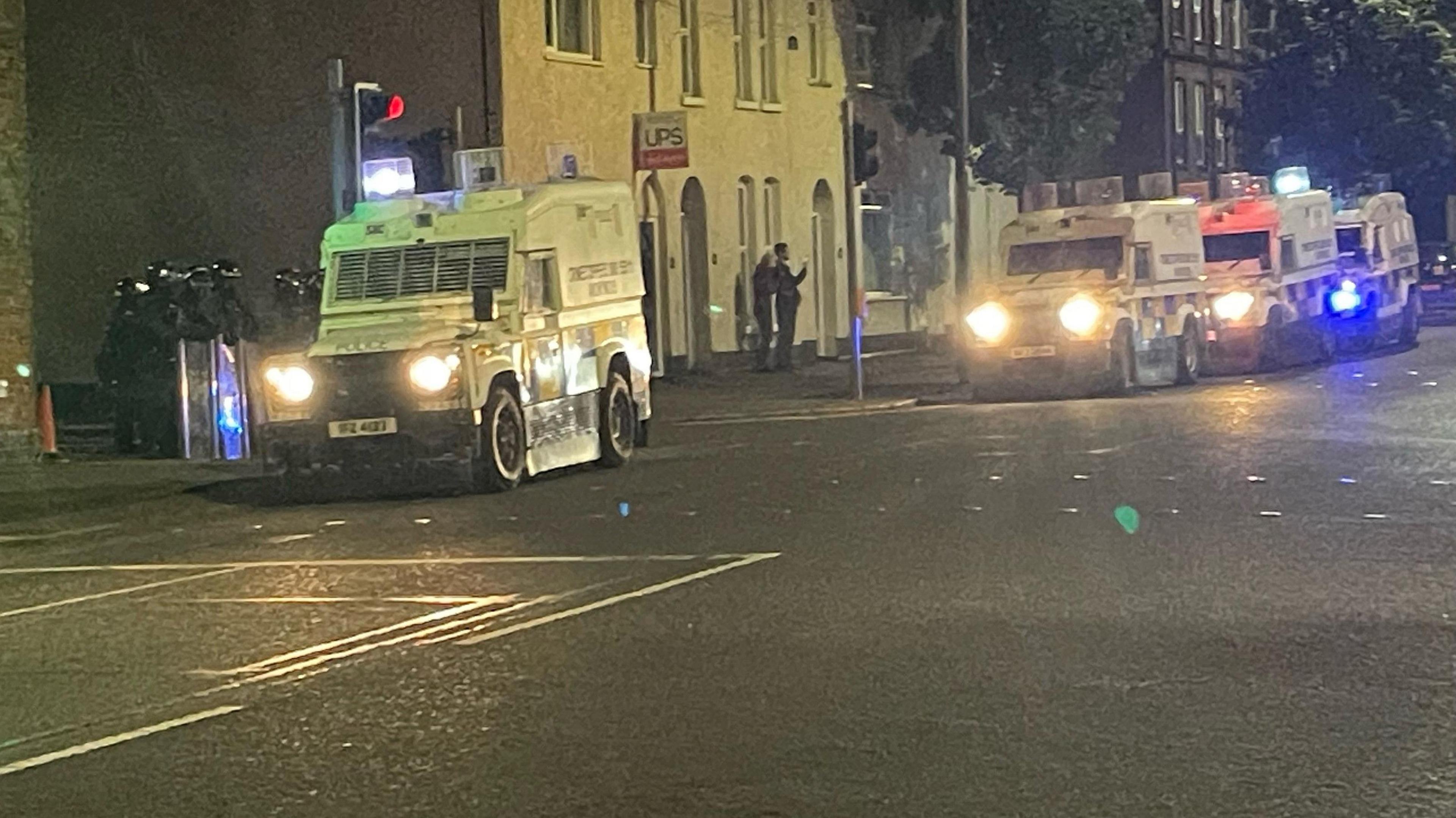 Police land rovers parked on a road in east Belfast 