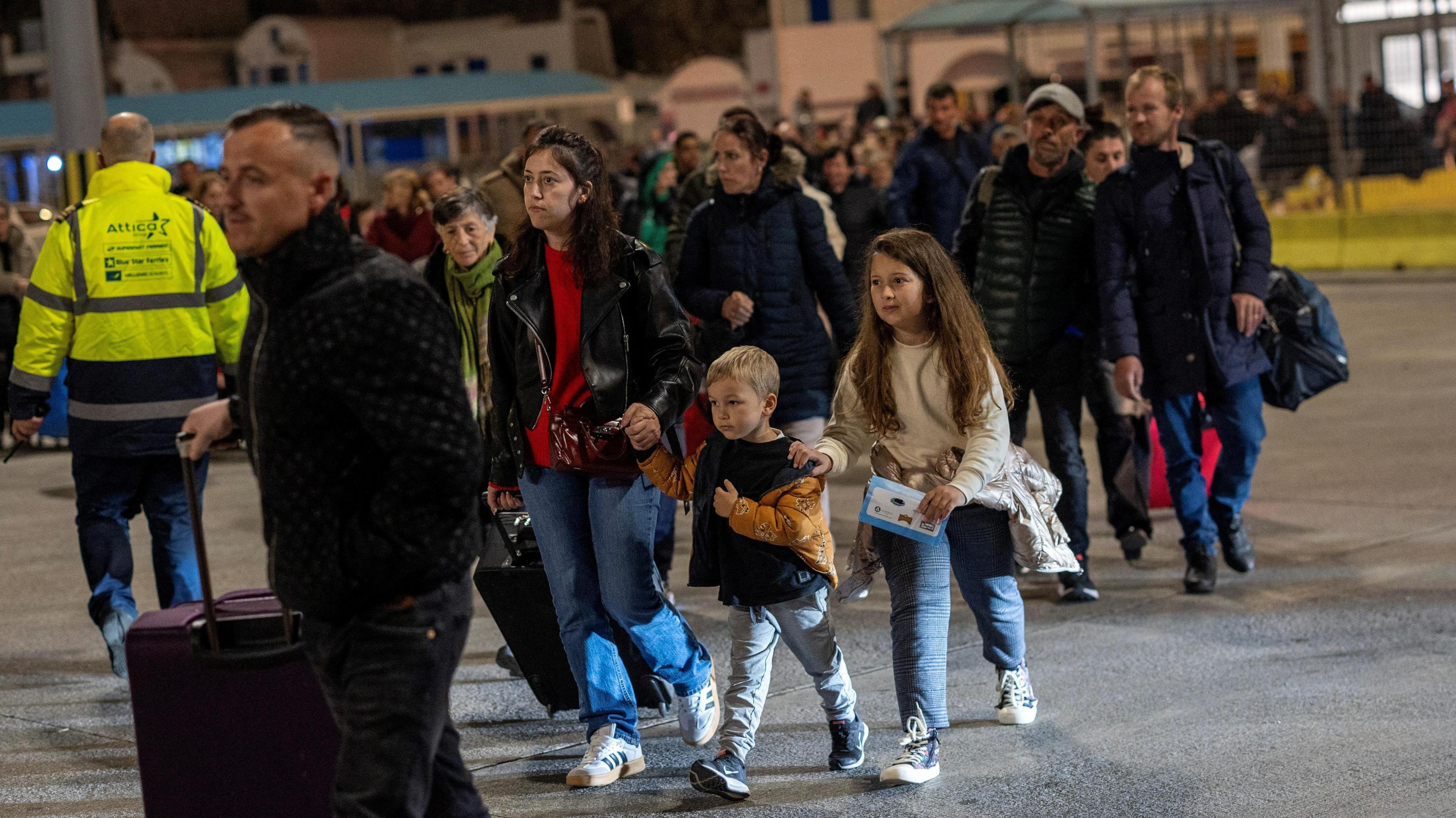 Children and adults leaving the island. 