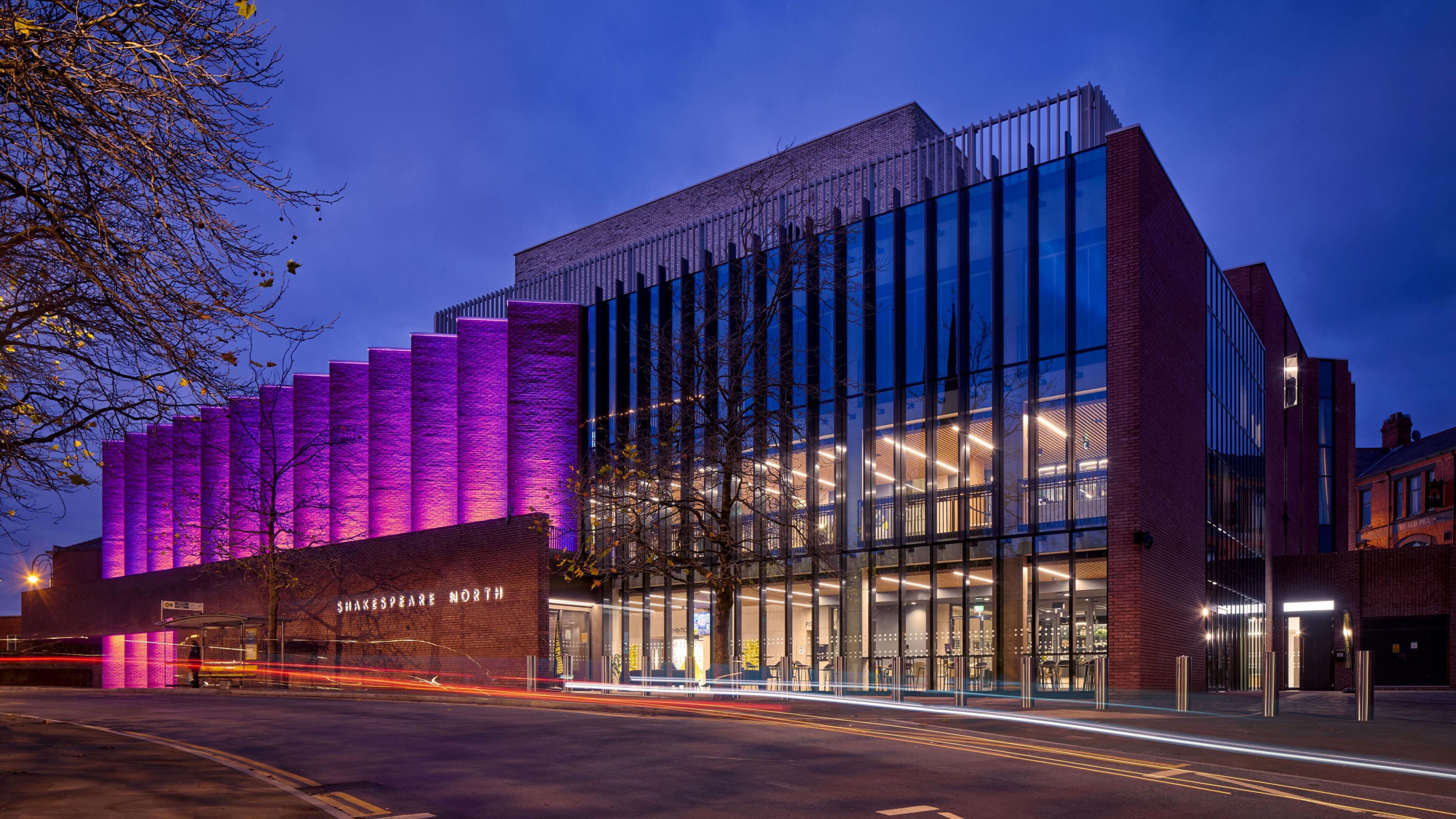 Shakespeare North Playhouse in Preston, lit up at night