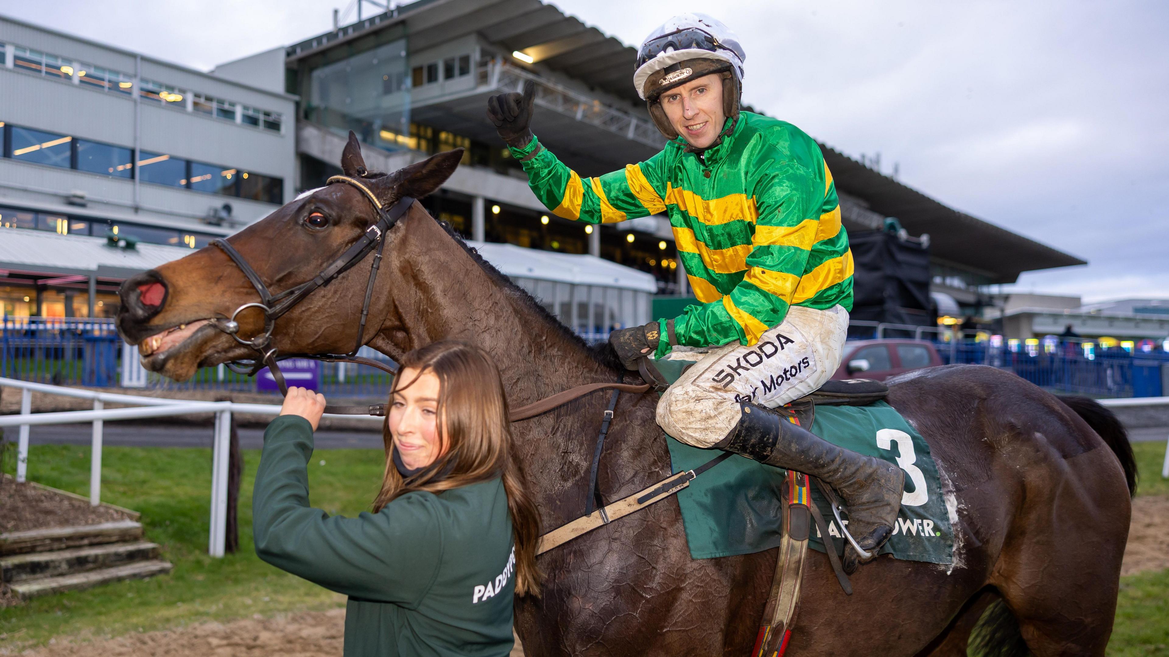 Jockey Mark Walsh and groom Georgia Fenwick with Fact To File