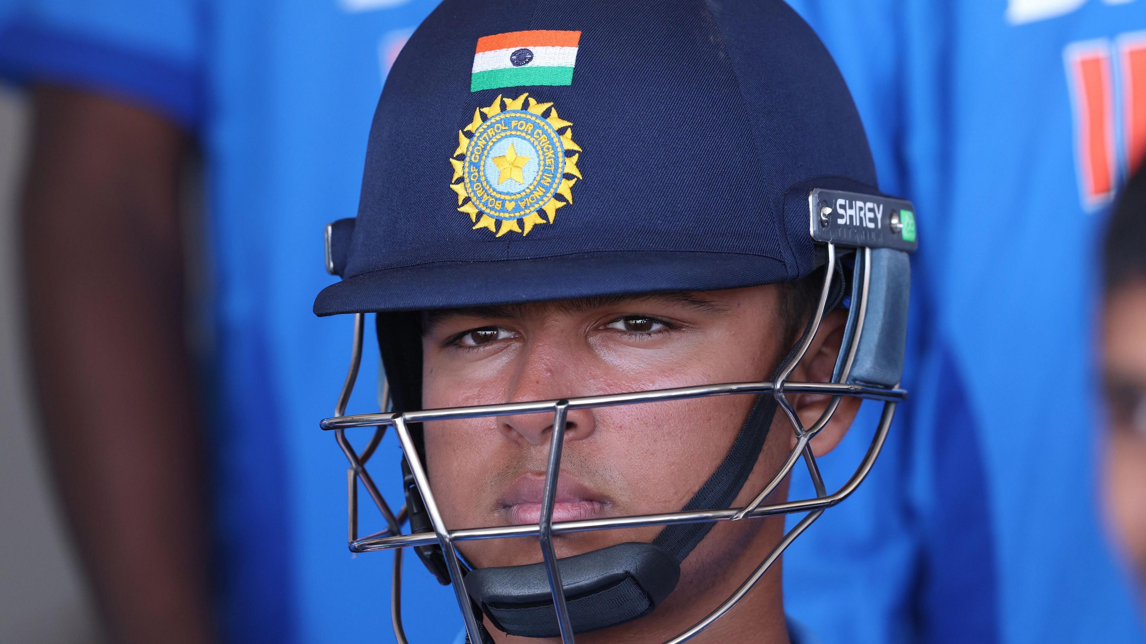 Vaibhav Sooryavanshi wearing an India helmet waiting to bat