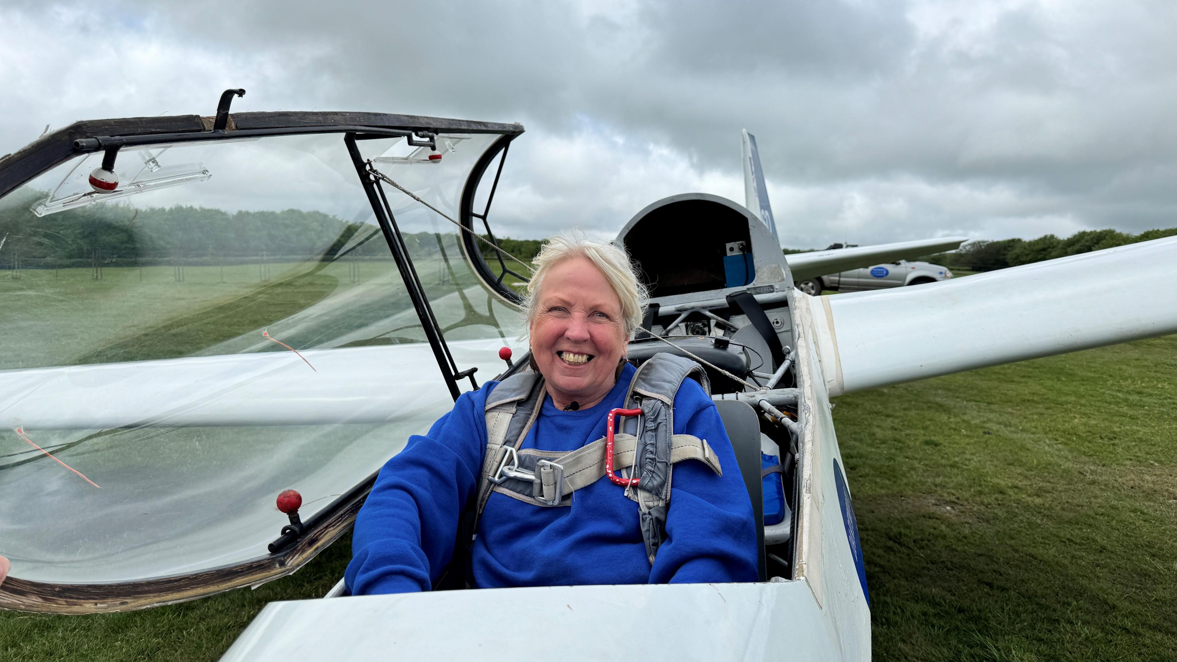 Val Kiely sitting in a glider