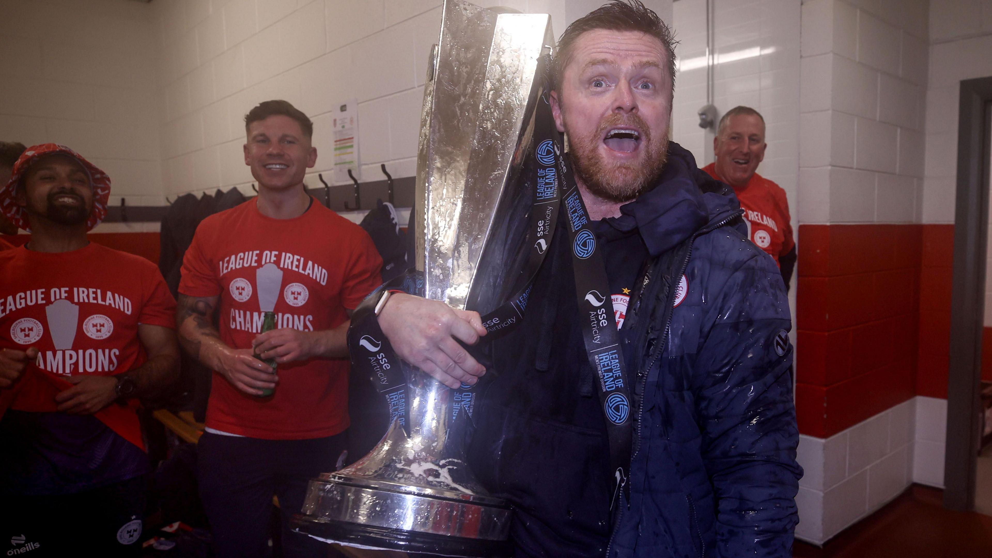 Damien Duff lifts the title