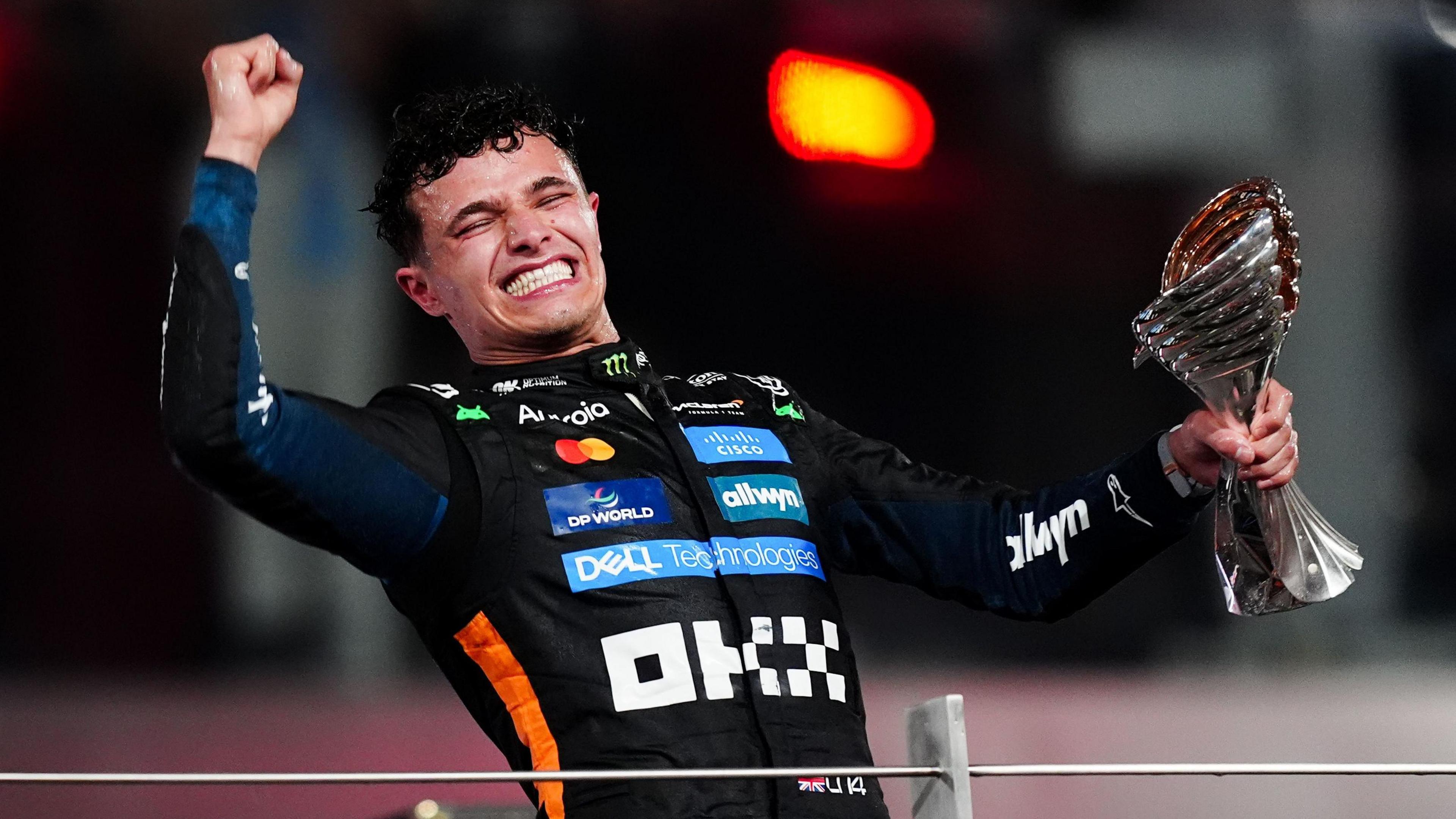 F1 champ Lando Norris celebrating a win