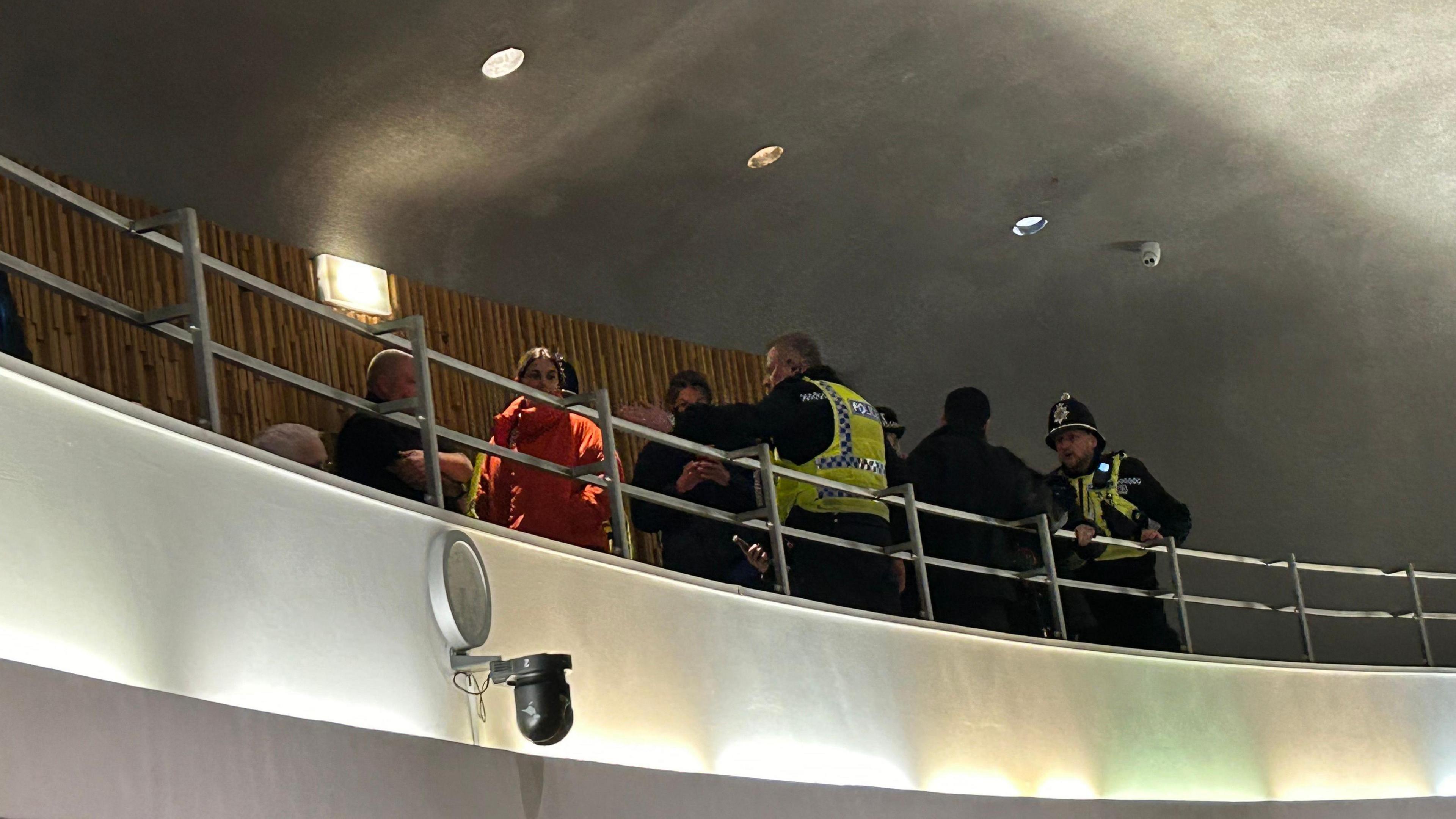 Protesters being removed from Newcastle Civic Centre by police officers