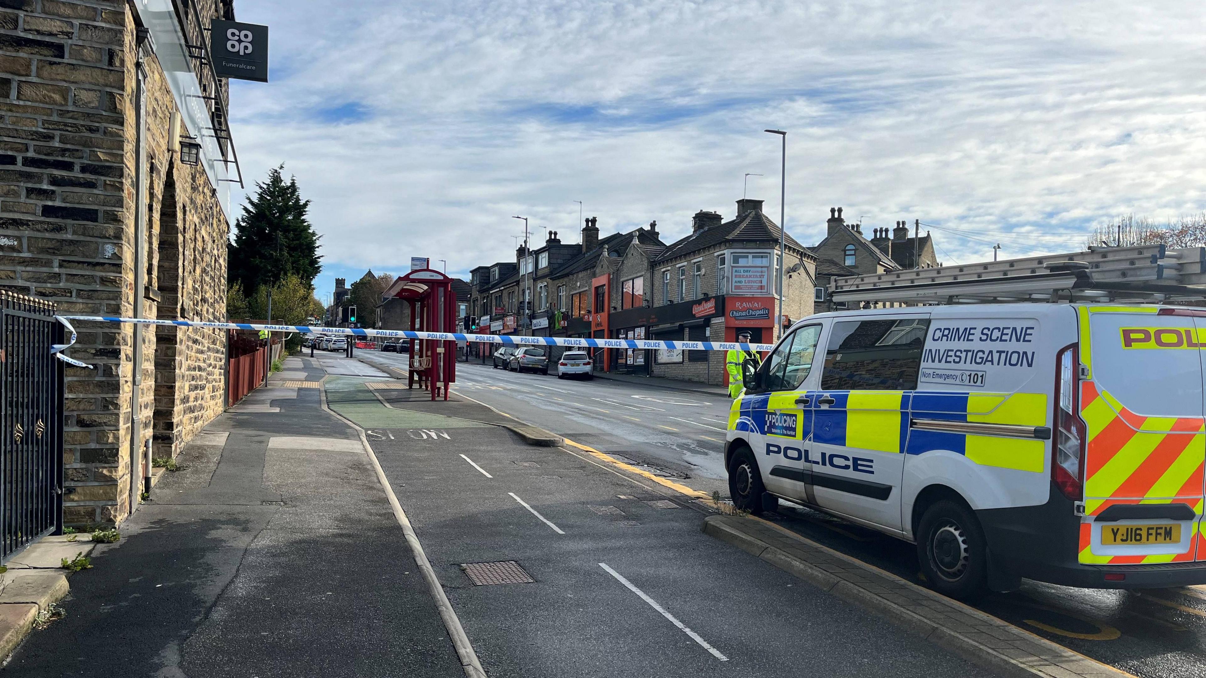 Police van outside cordoned off area in Bradford