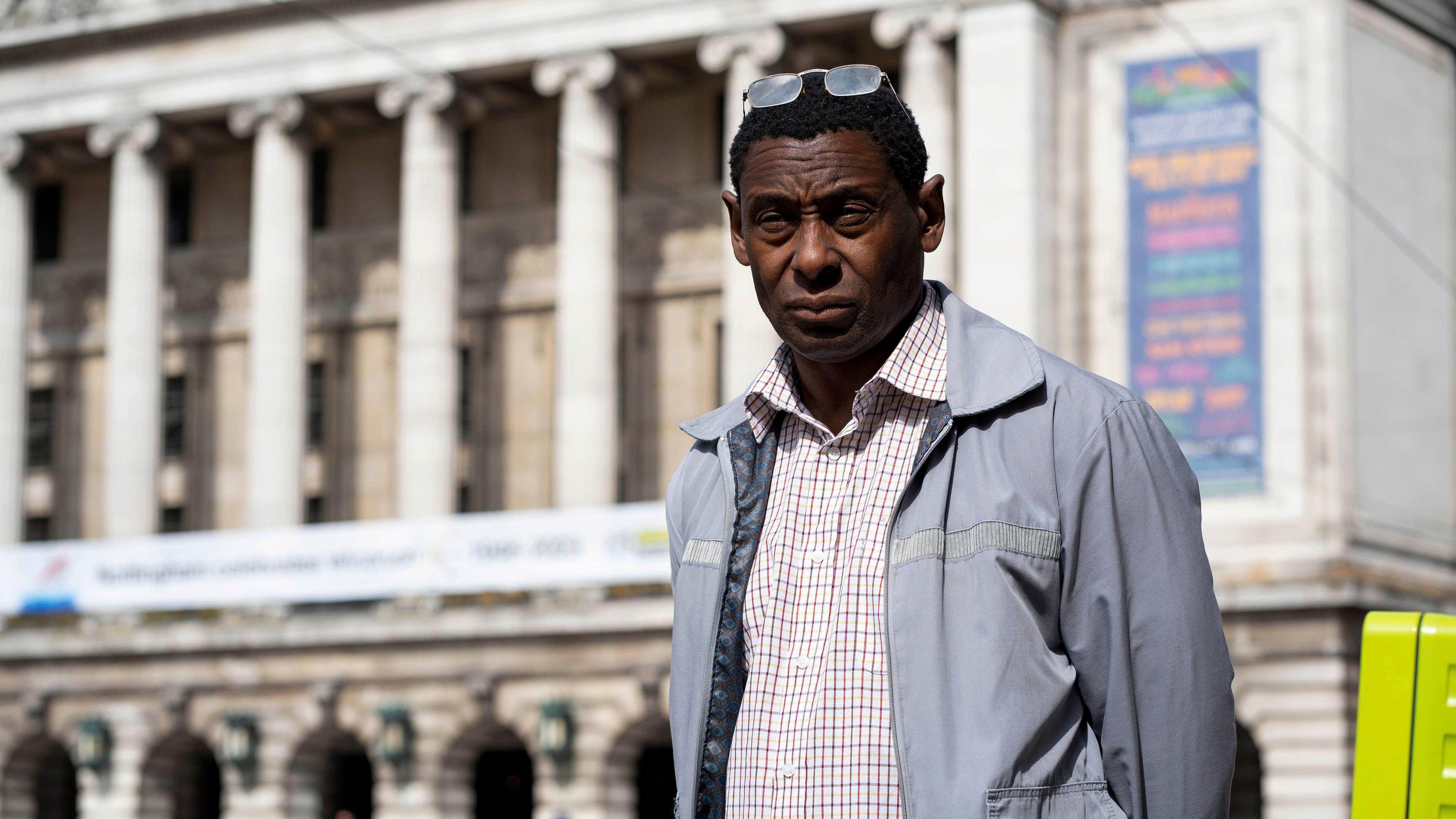 Dennis Bottomley played by David Harewood in series two of Sherwood, standing outside Nottingham's Council House.