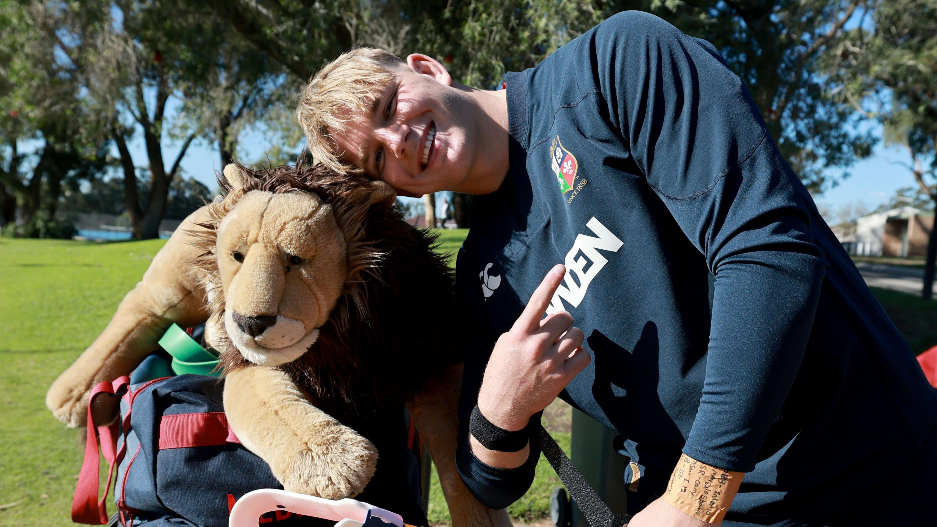 Henry Pollock and the Lions mascot
