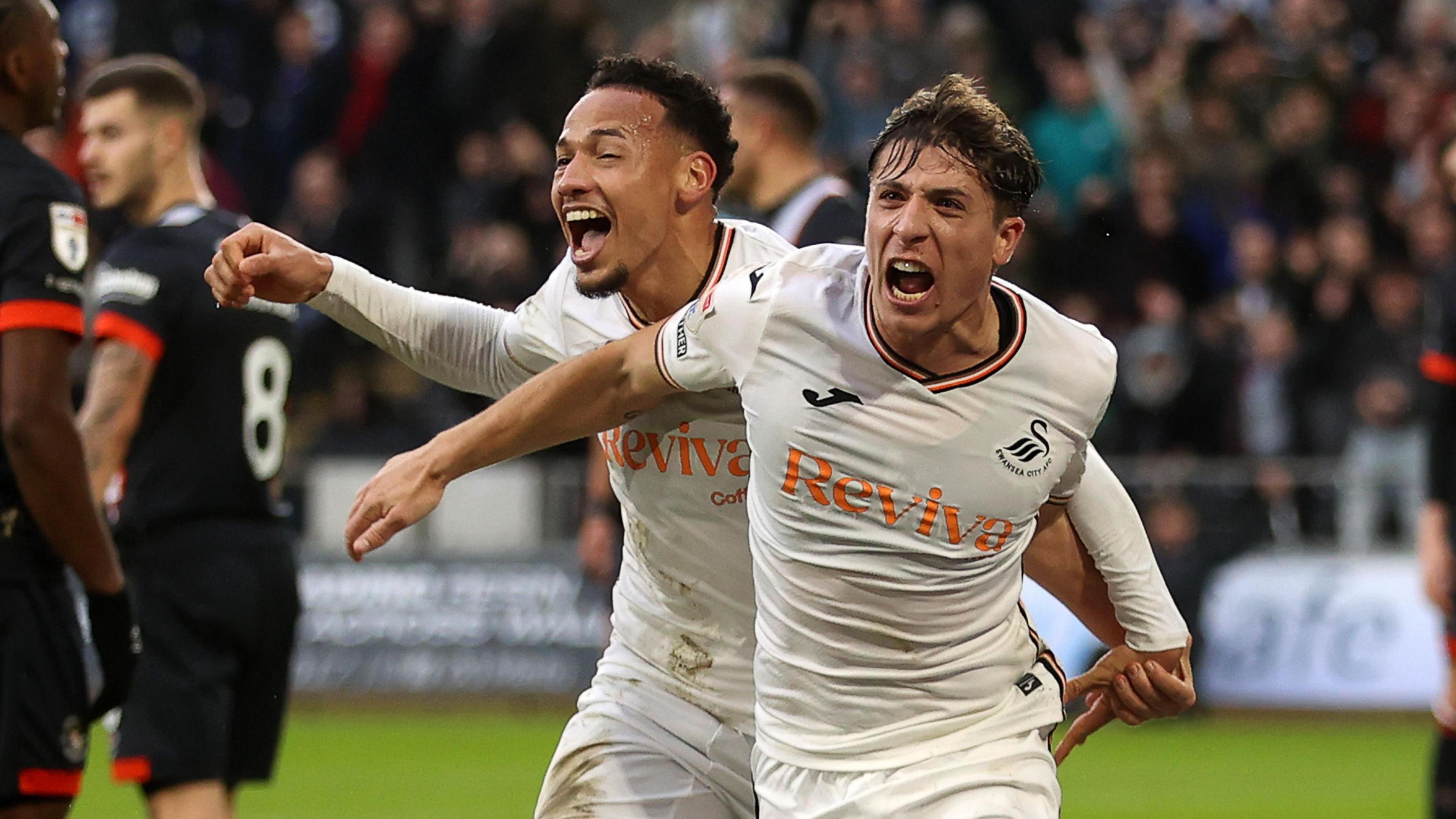 Goncalo Franco celebrates with Ronald 