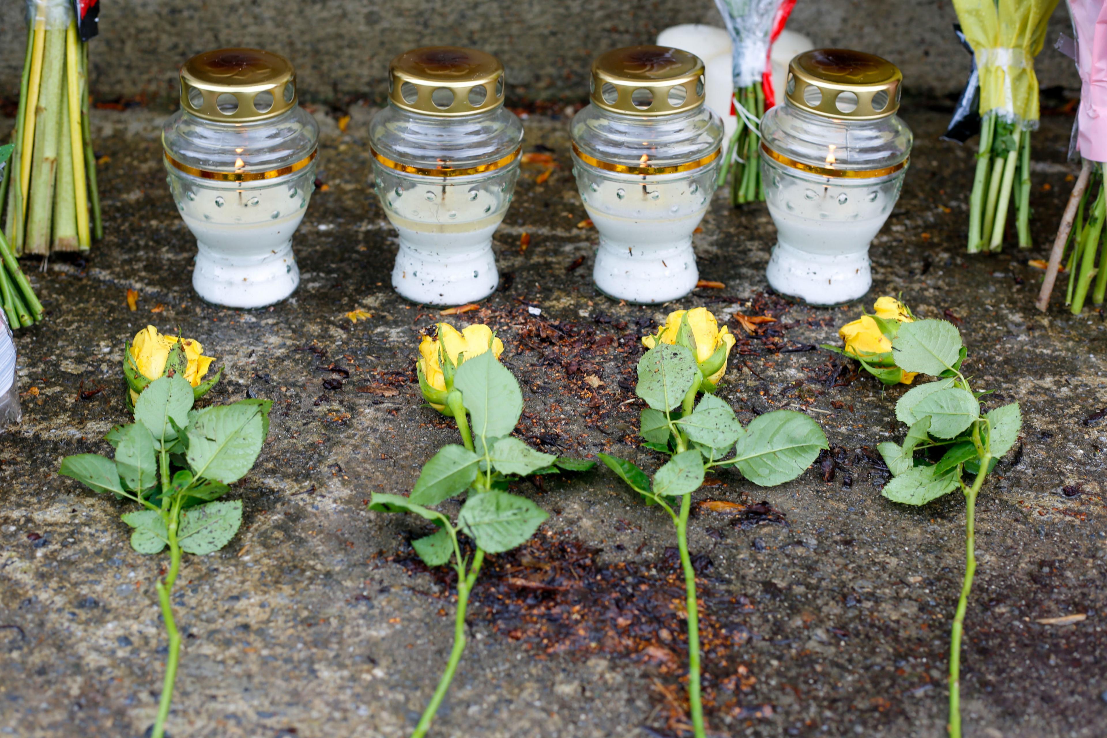 Four candles and roses in Clonmel