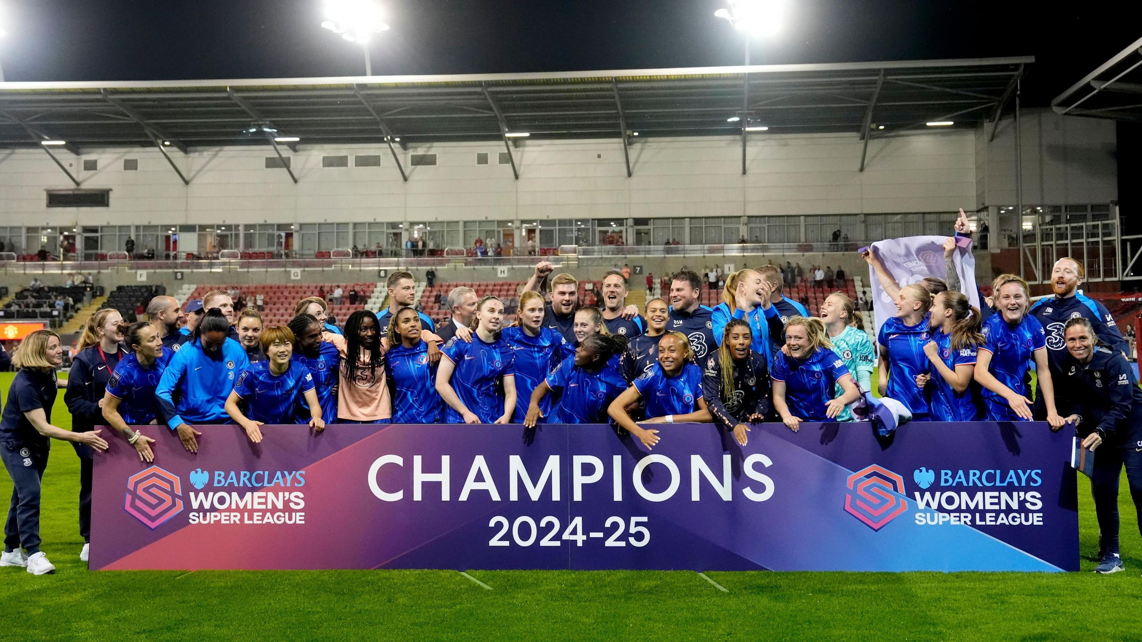 Chelsea celebrate after winning the Women's Super League