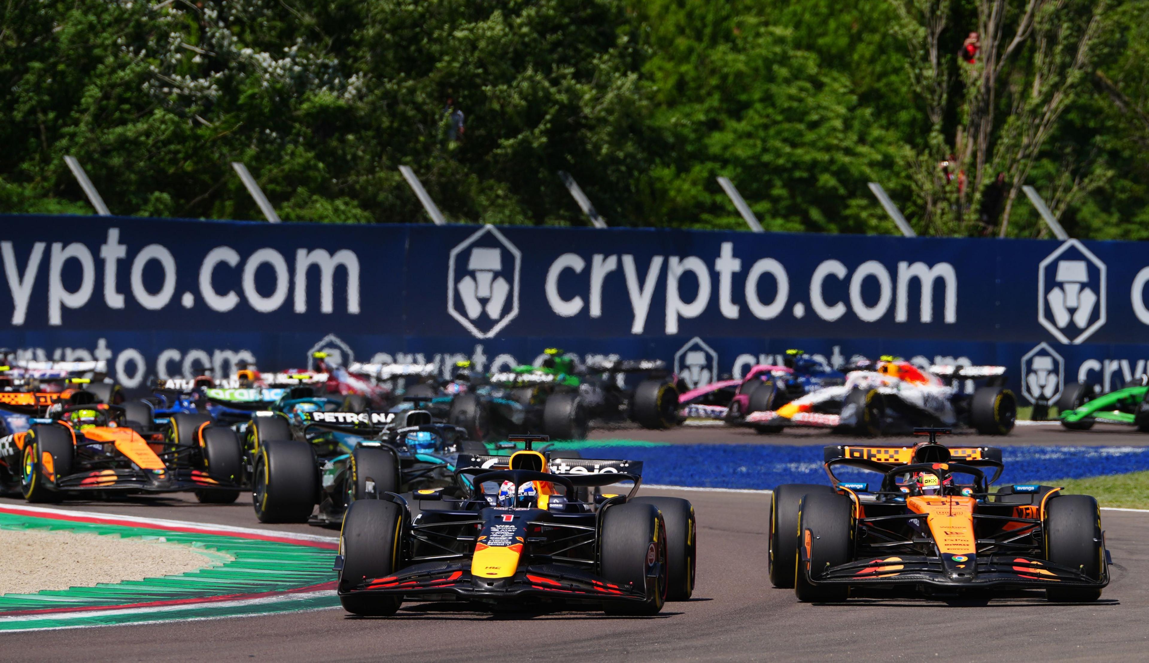 Max Verstappen overtakes Oscar Piastri for the race lead in Imola 