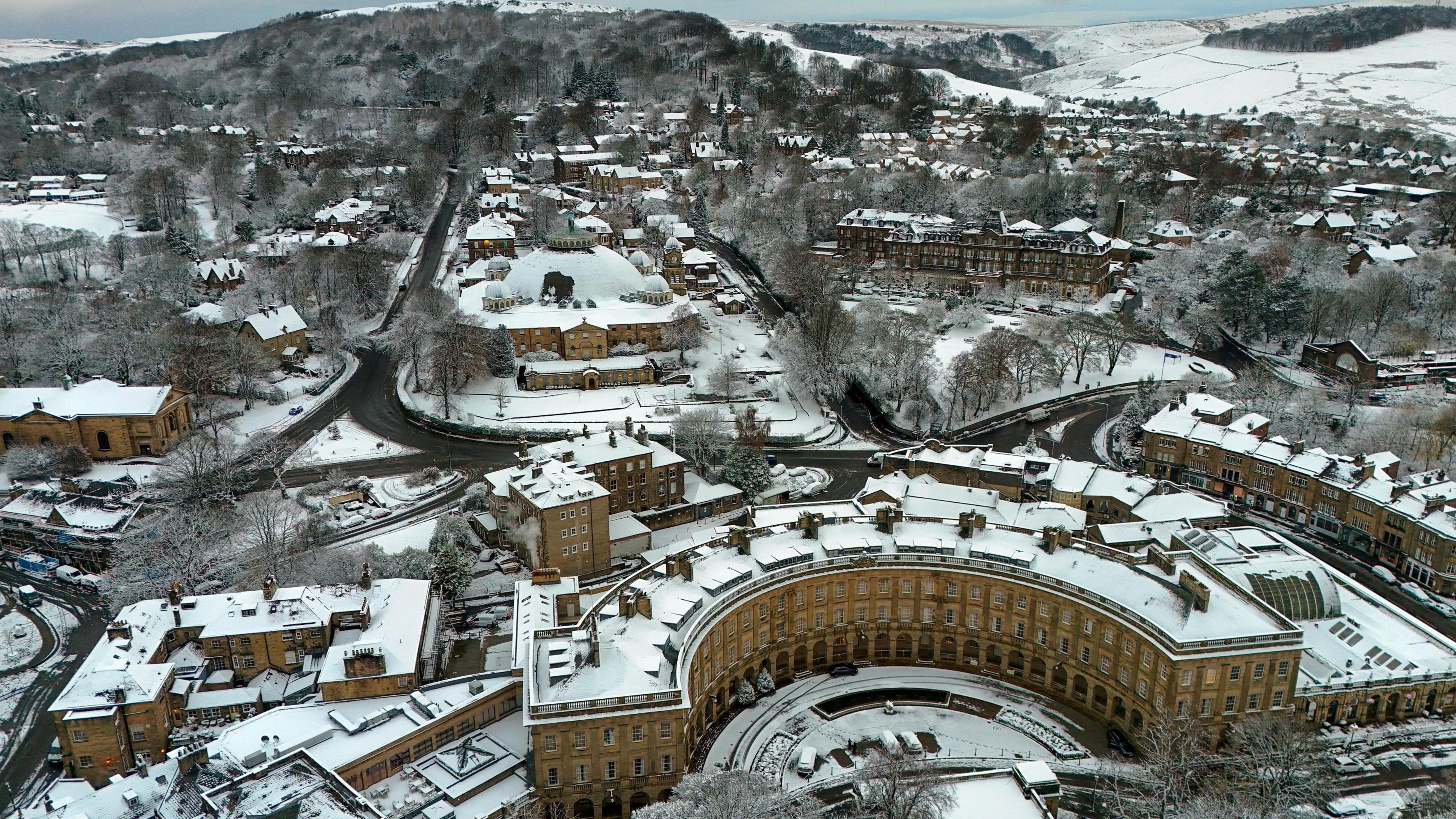 Buxton, with Buxton Crescent in the foreground, shown after snow has fallen.