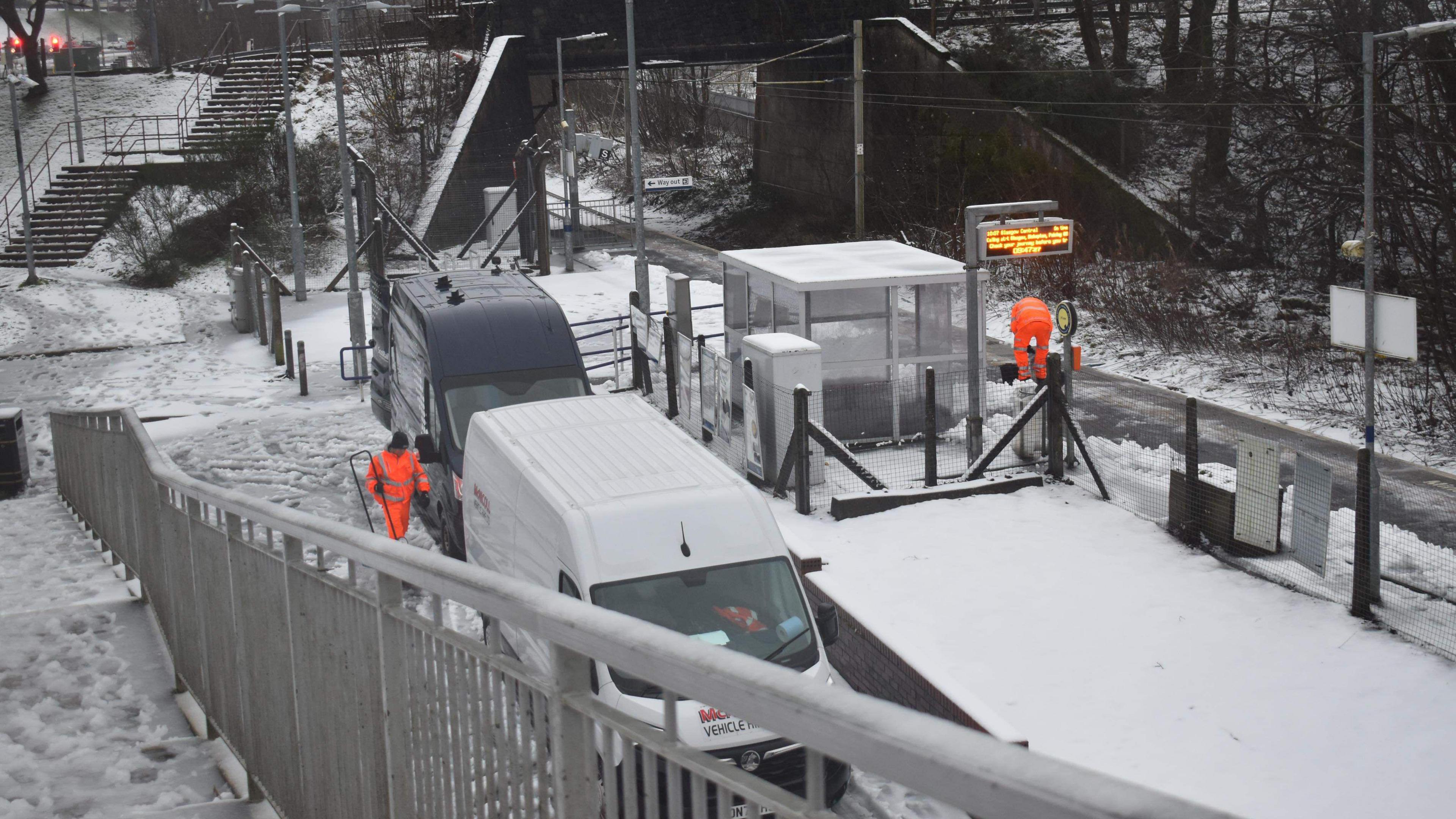 Snow covers a train station in Greenock, in Inverclyde, Scotland