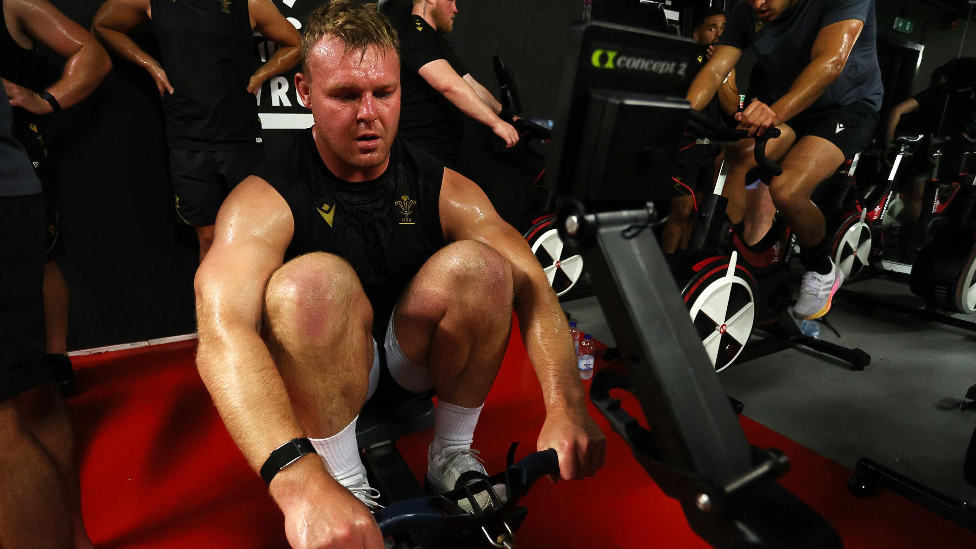 Dewi Lake on the rowing machine in training