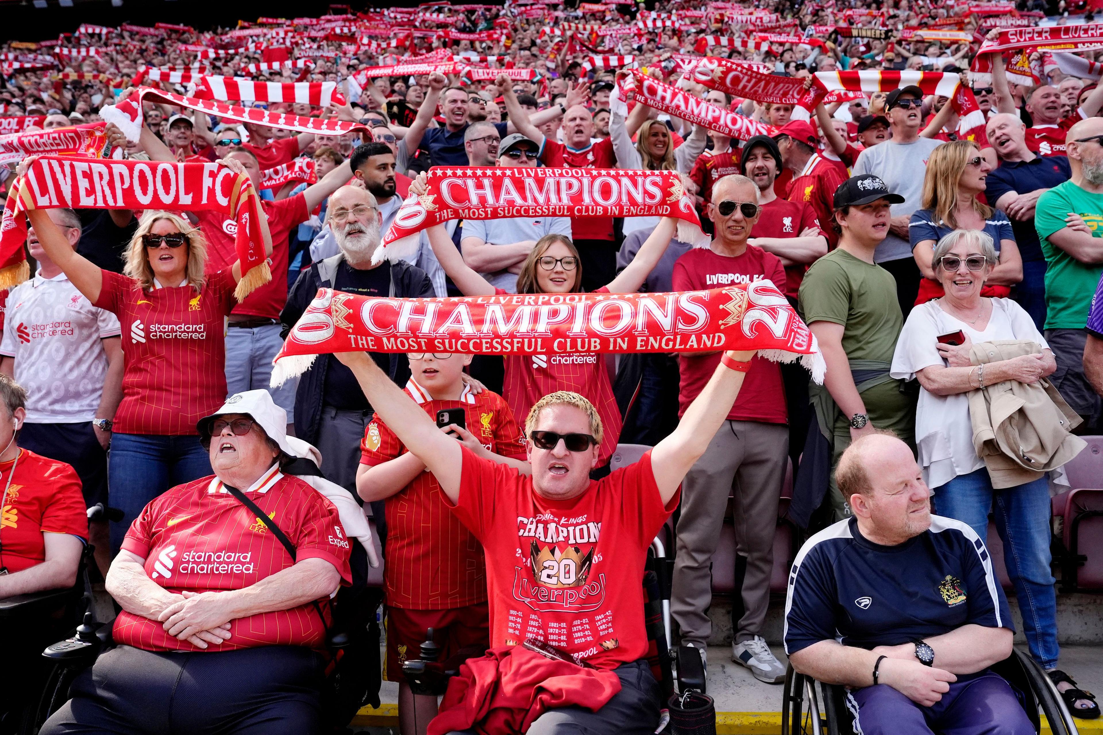 Liverpool fans celebrate winning the Premier League