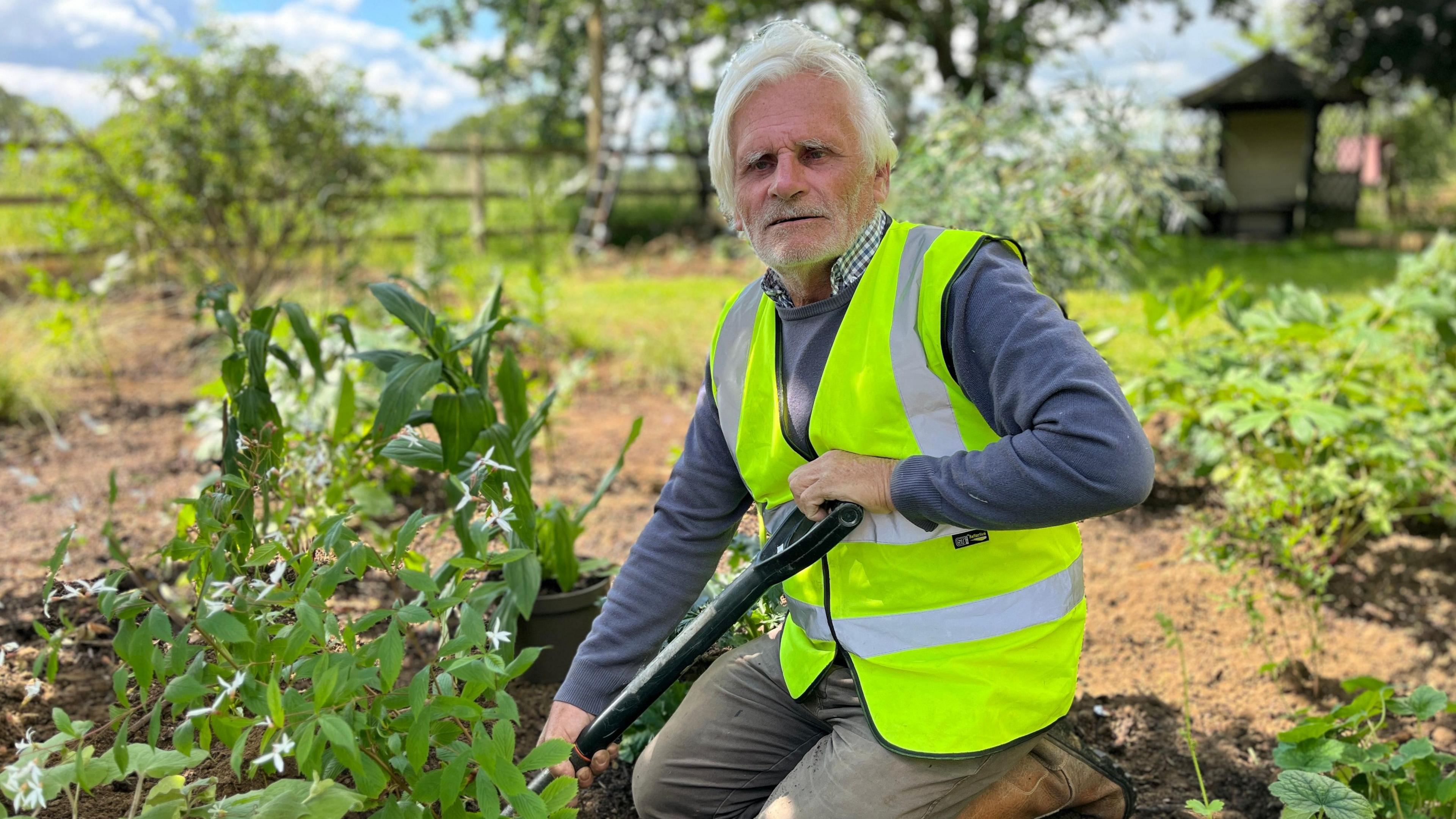 John McPherson doing some gardening