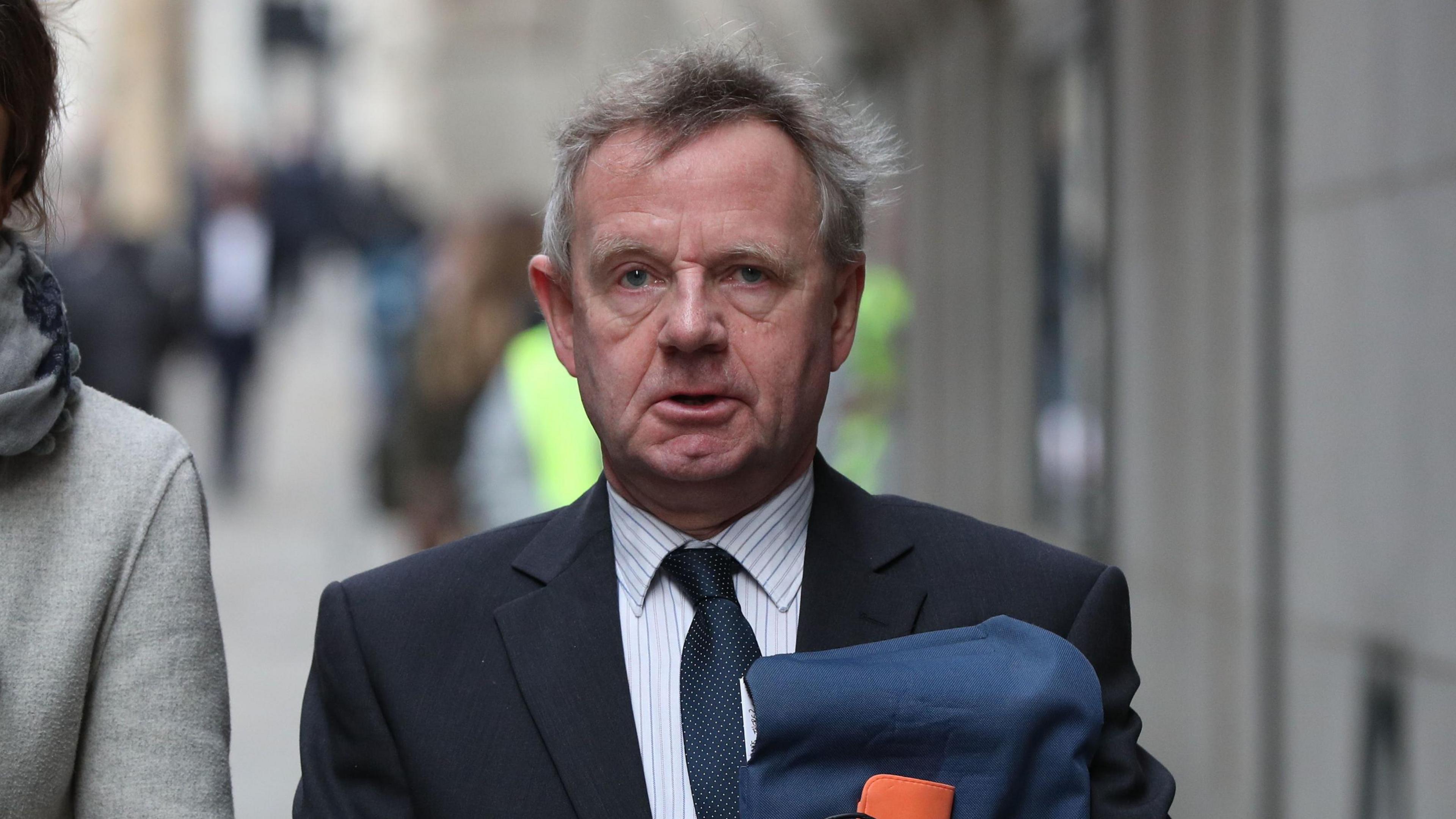 Pilot Andrew Hill, who was charged over the Shoreham Airshow crash, leaves the Old Bailey in London