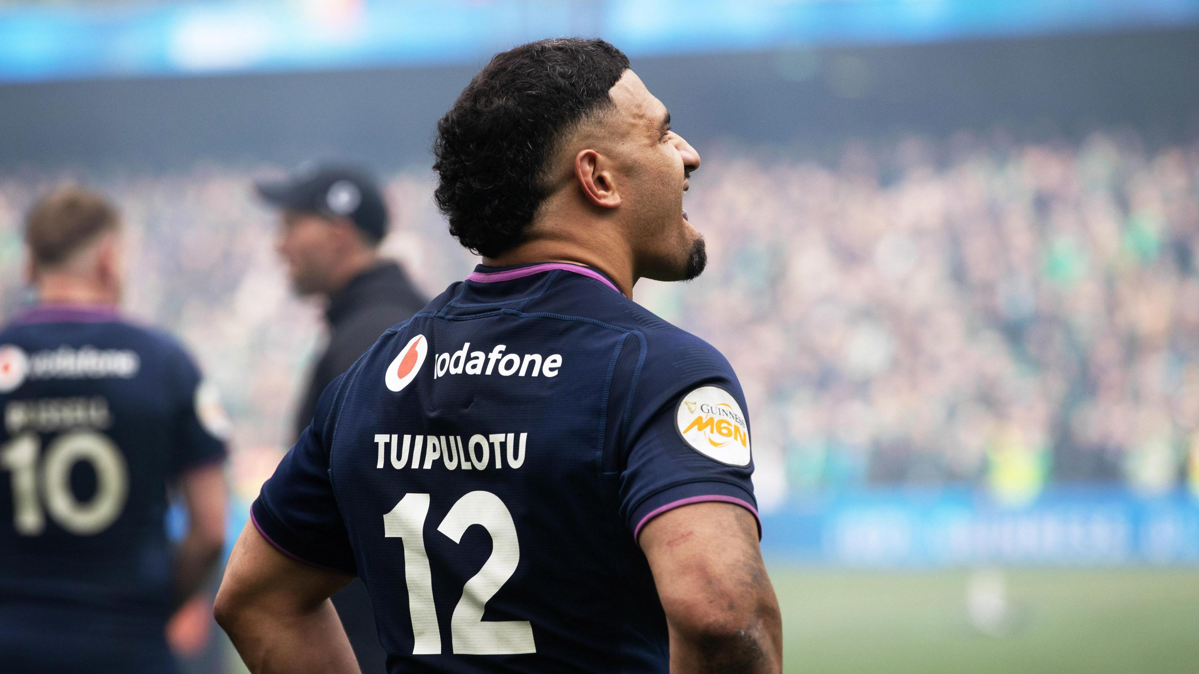 Sione Tuipulotu looks dejected after Scotland's Six Nations defeat by Ireland