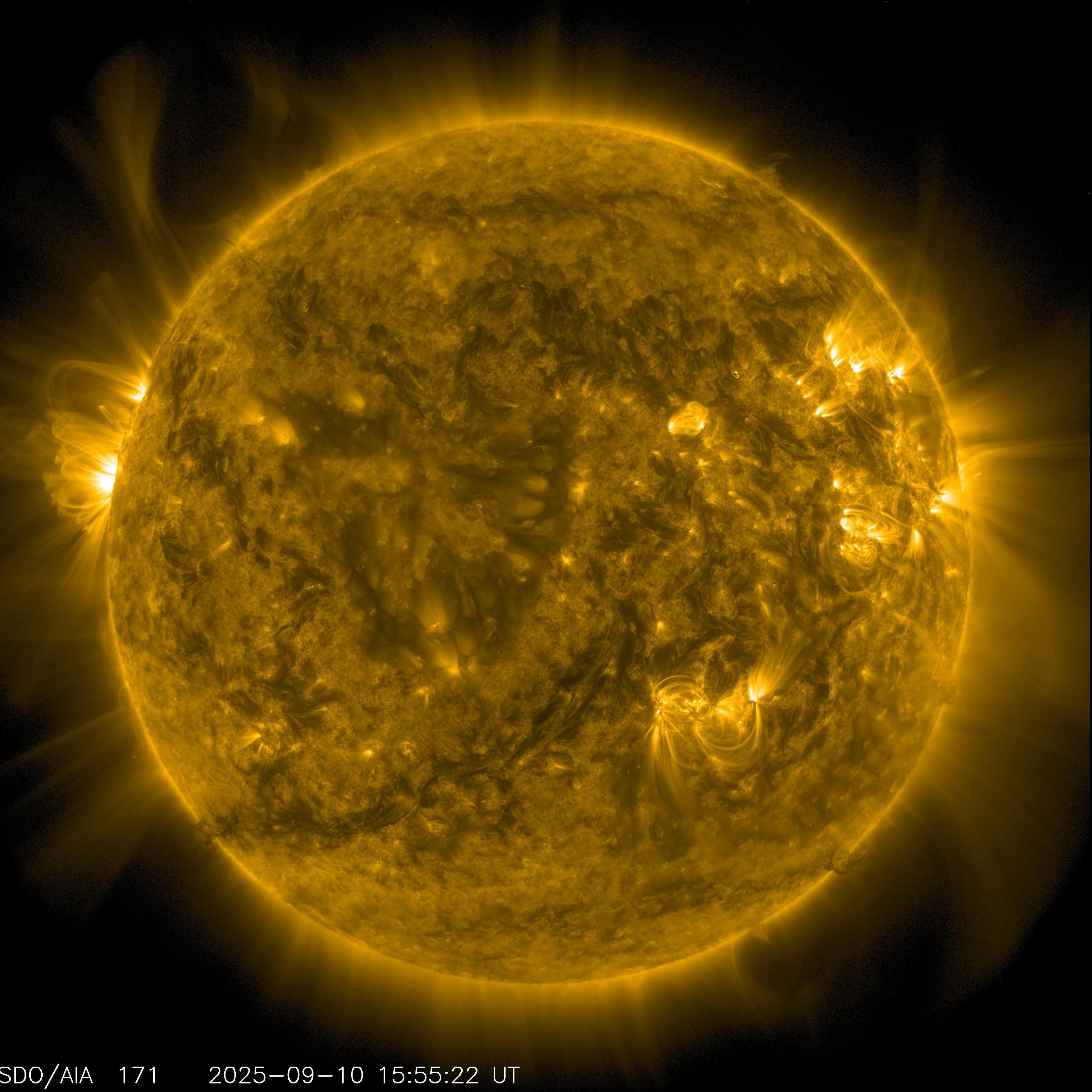 An image of the Sun - with the star appearing bright yellow against a black background - that was captured by NASA, the US Space Agency. The picture gives a vivid sense of how much energy is emitted from the Sun - the surface visibly glows and there are ejections of hot, glowing gas into space.    