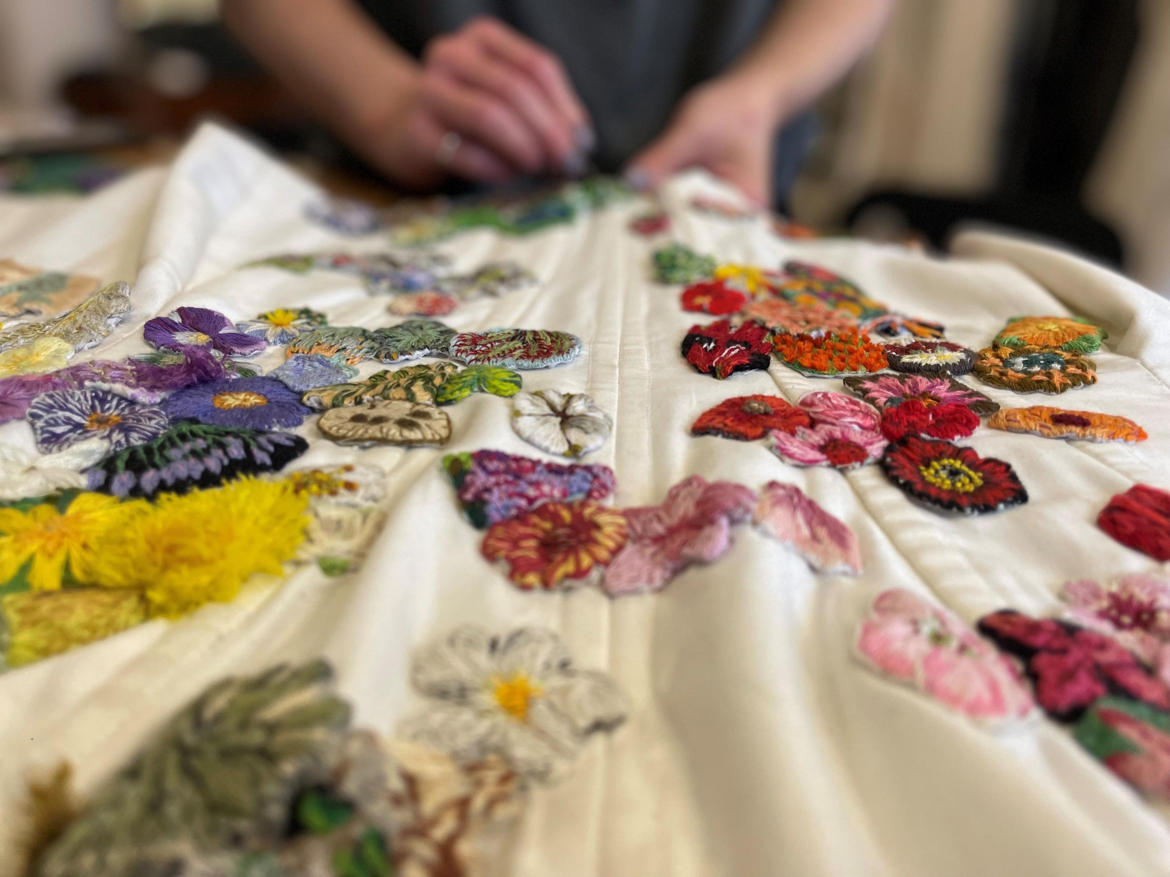 Dress with hand-embroidered flowers 