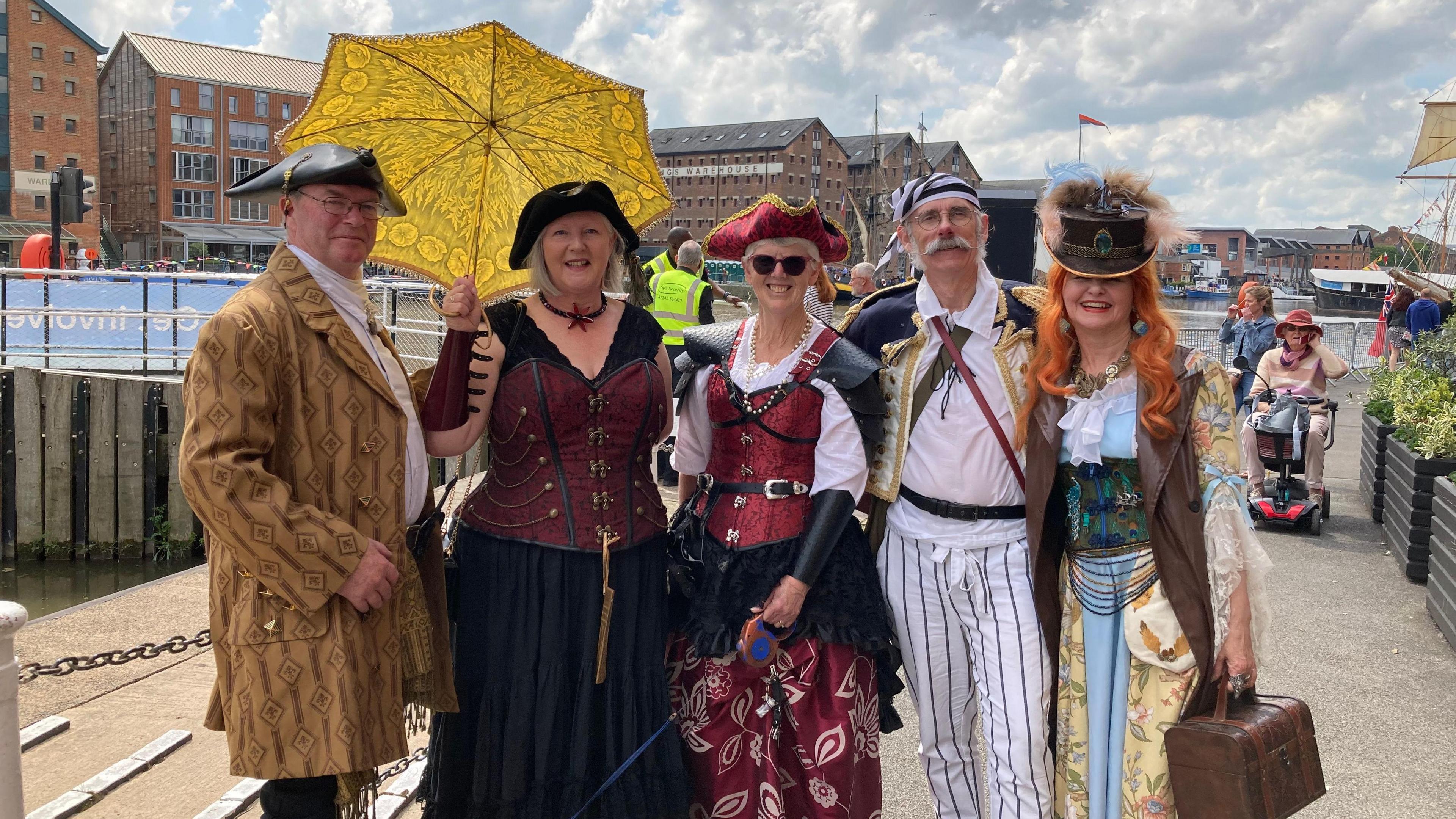 People in fancy dress at Gloucester Docks during the Tall Ships Festival 2024