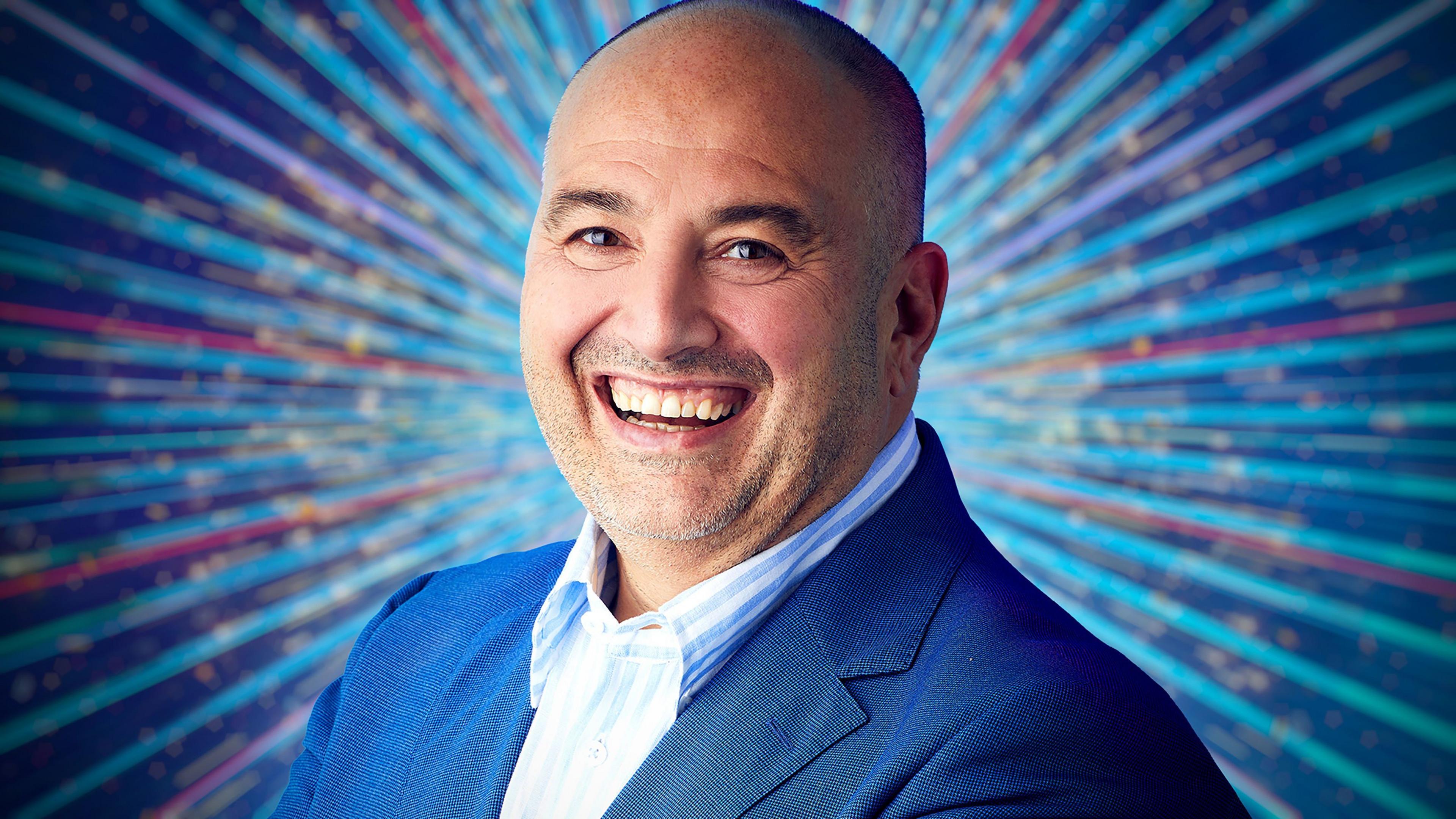 Wynne Evans, in a blue suit jacket
