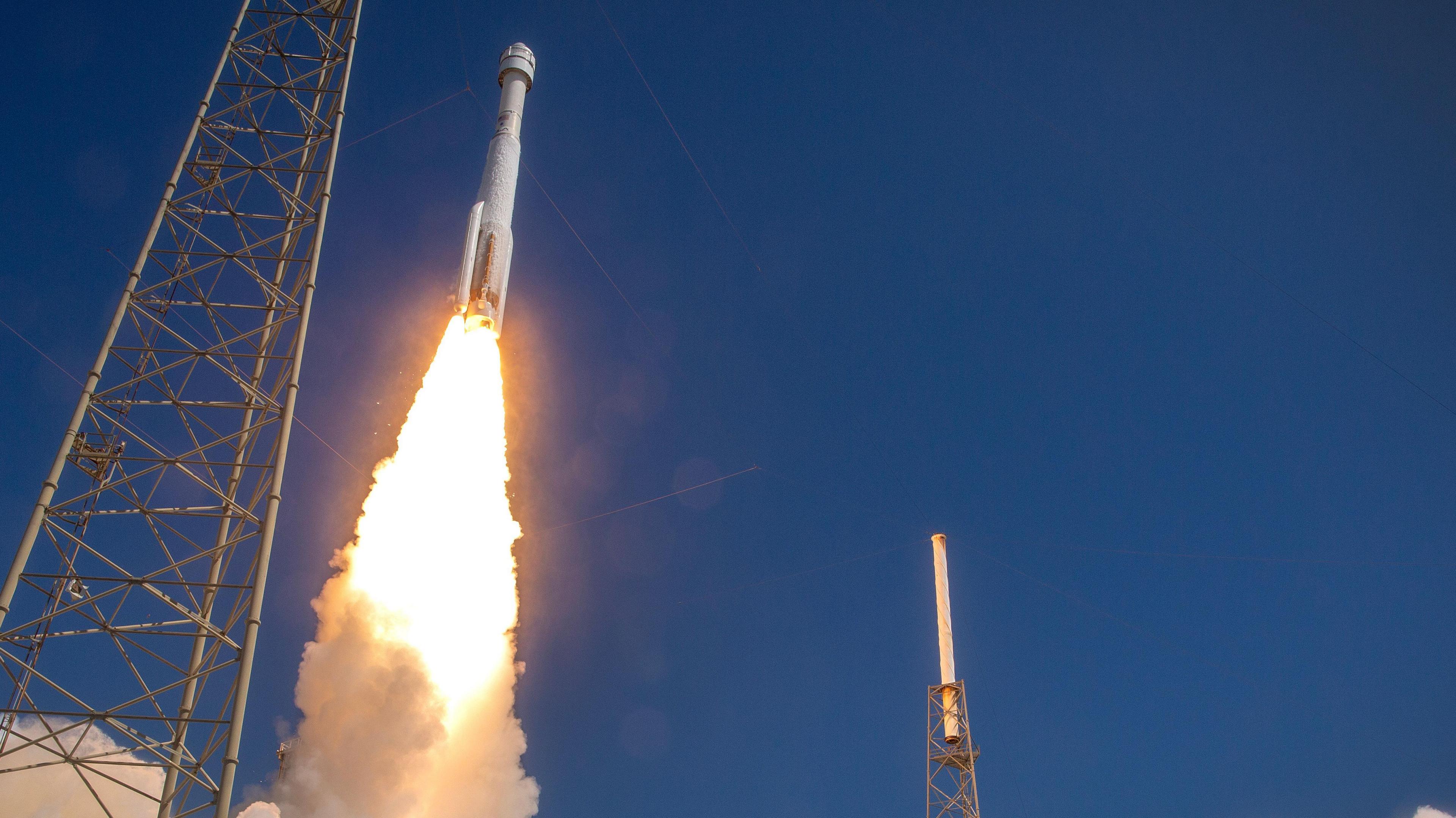 Starliner blasting off from Earth