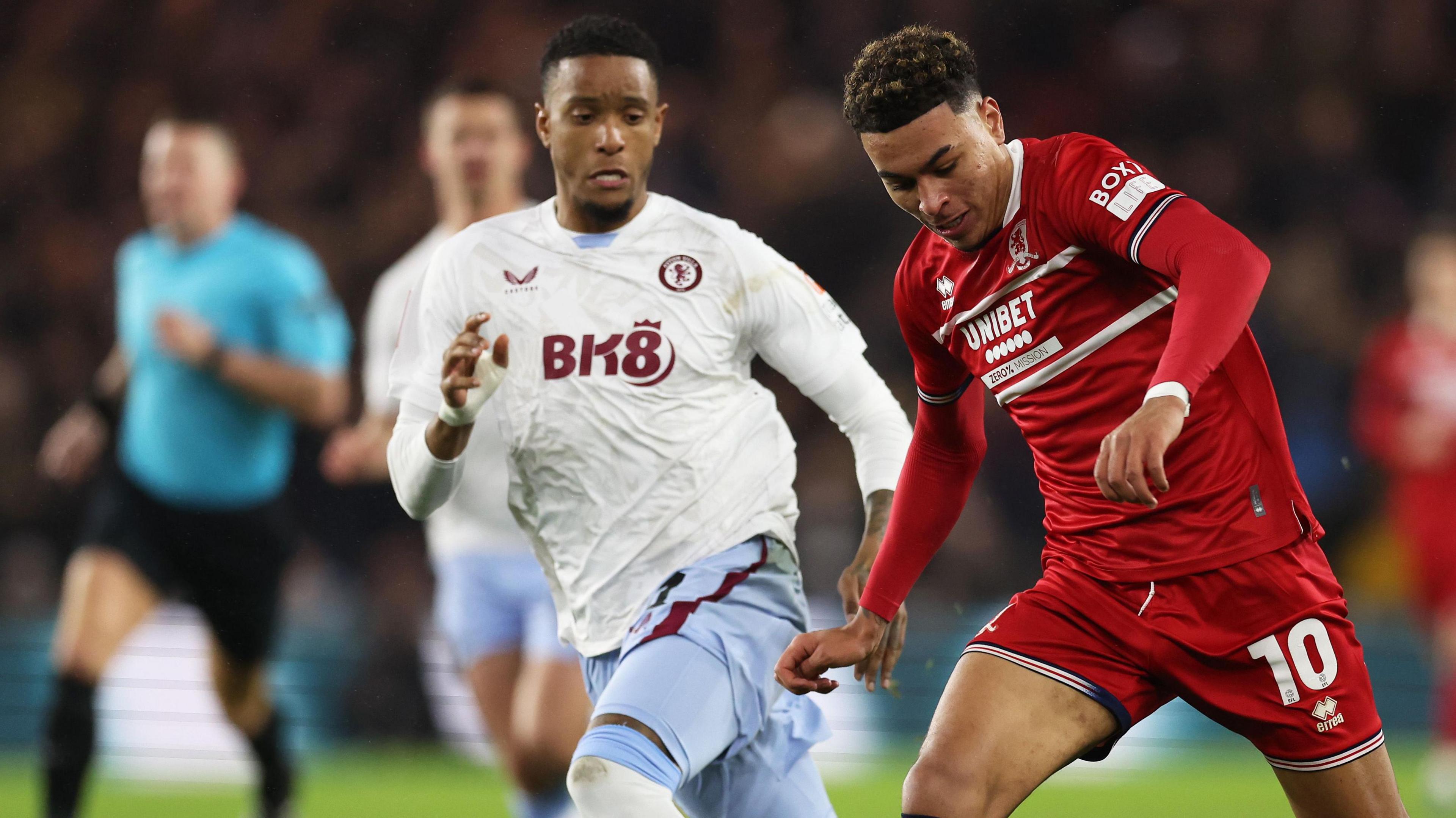 Morgan Rogers dribbles the ball for Middlesbrough playing against Aston Villa