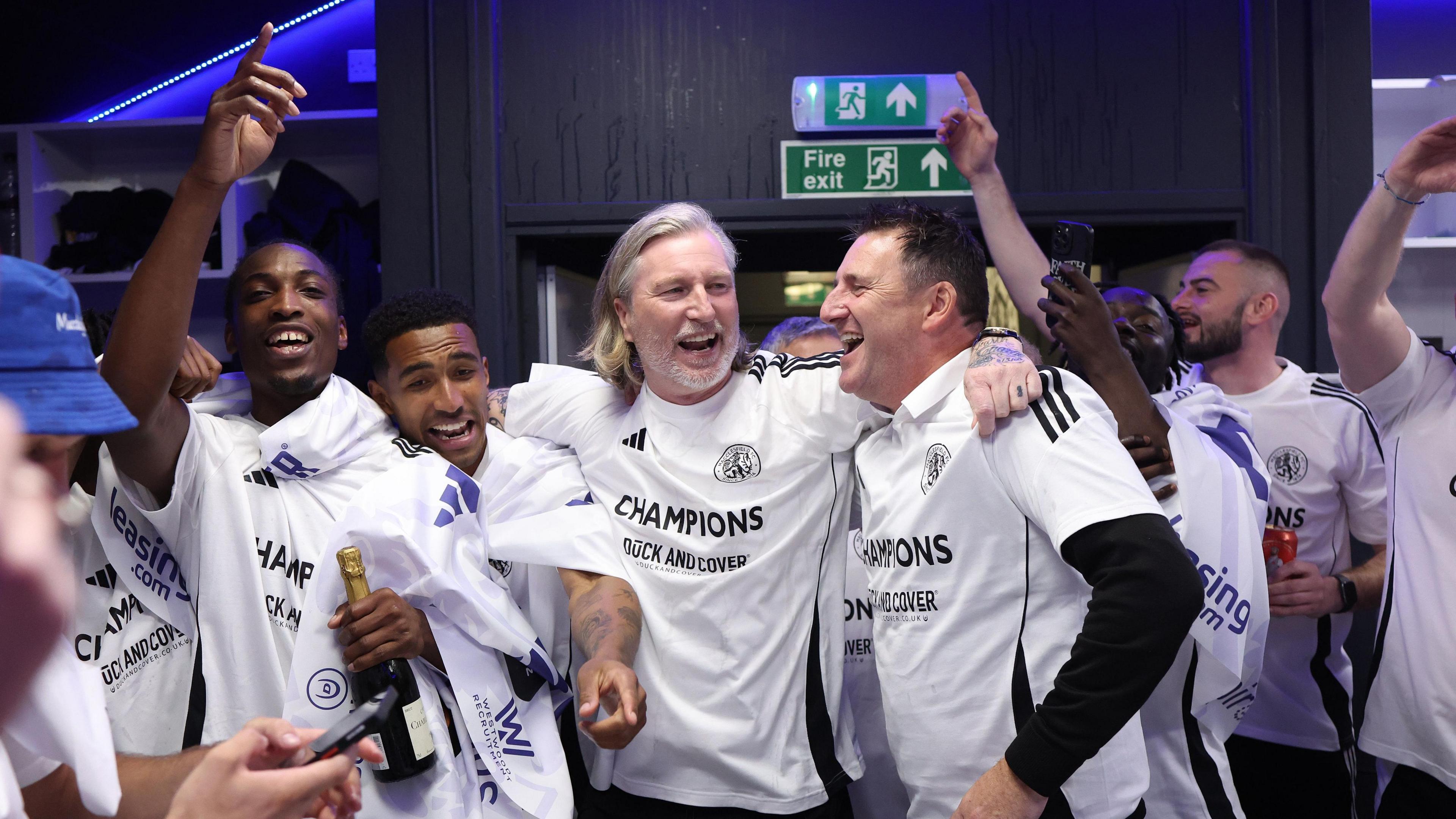 Macclesfield players celebrate promotion