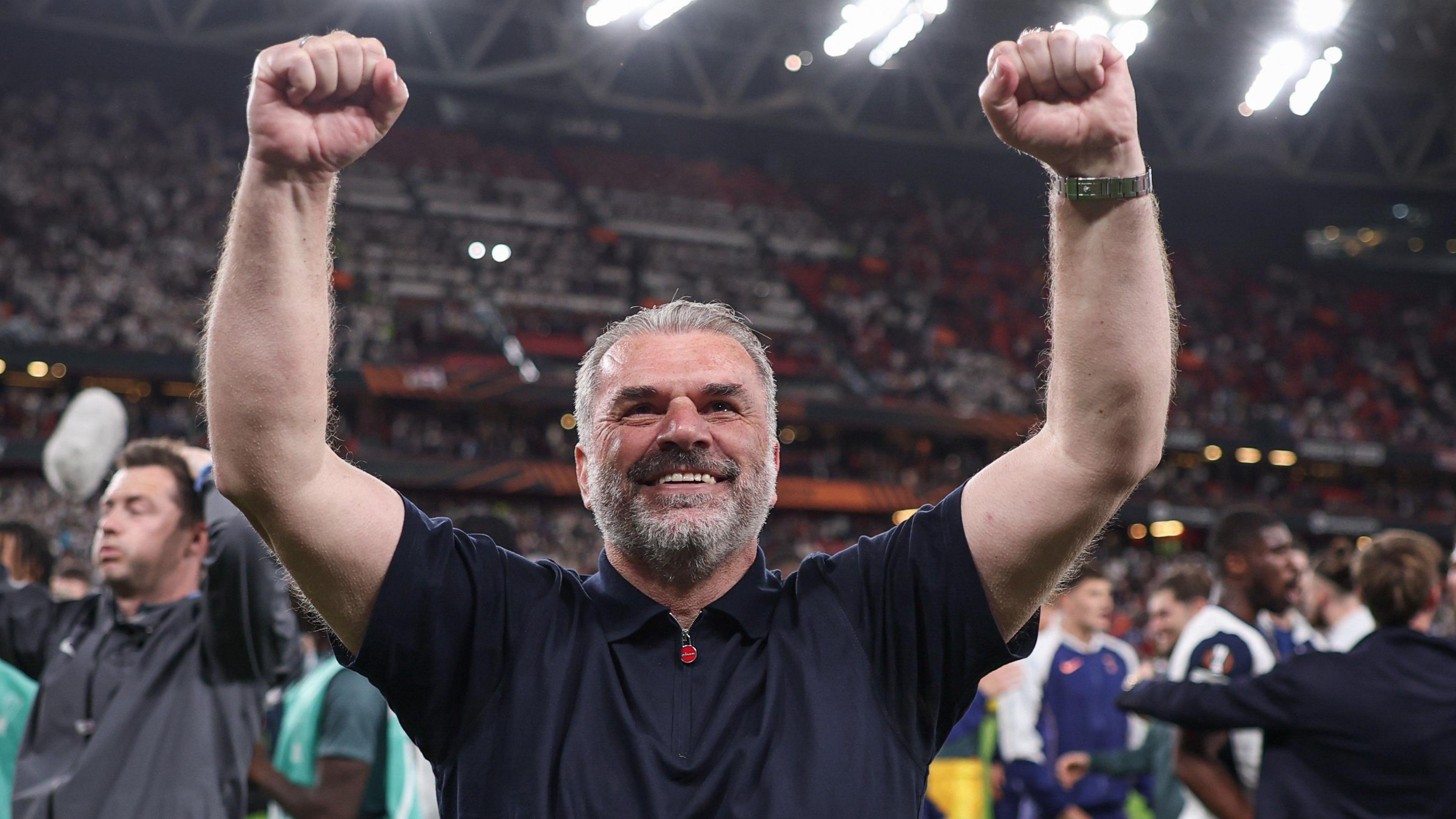 Ange Postecoglou celebrates Tottenham's Europa League win over Manchester United