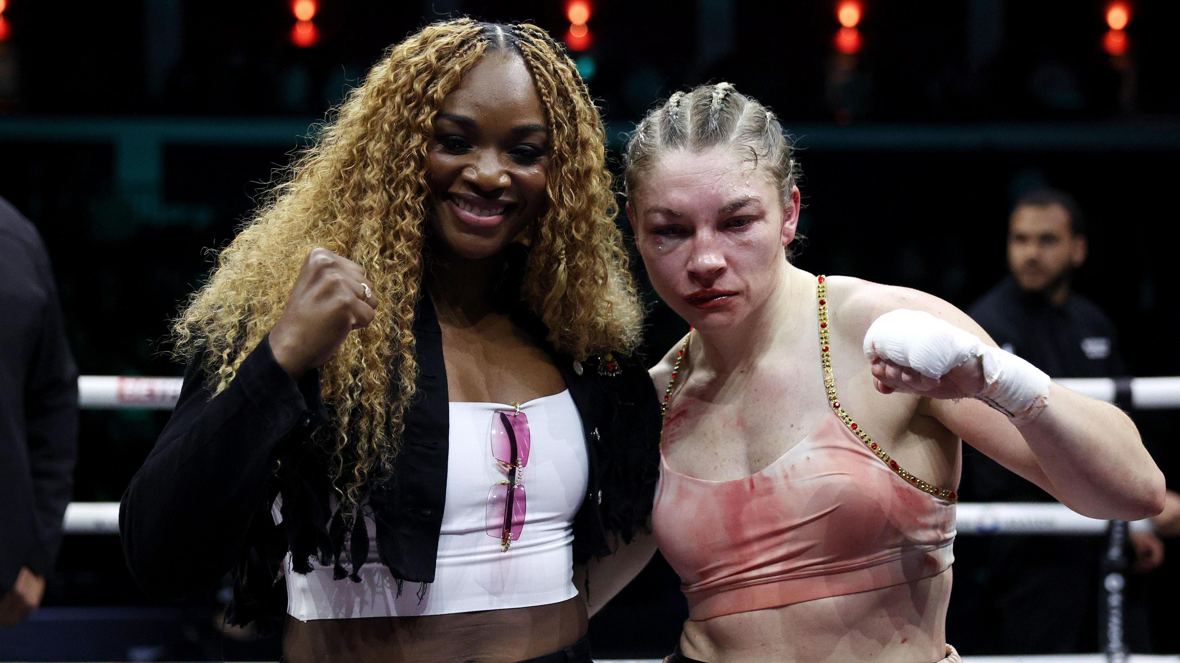 Claressa Shields and Lauren Price pose for photos after her win over Stephanie Pineiro