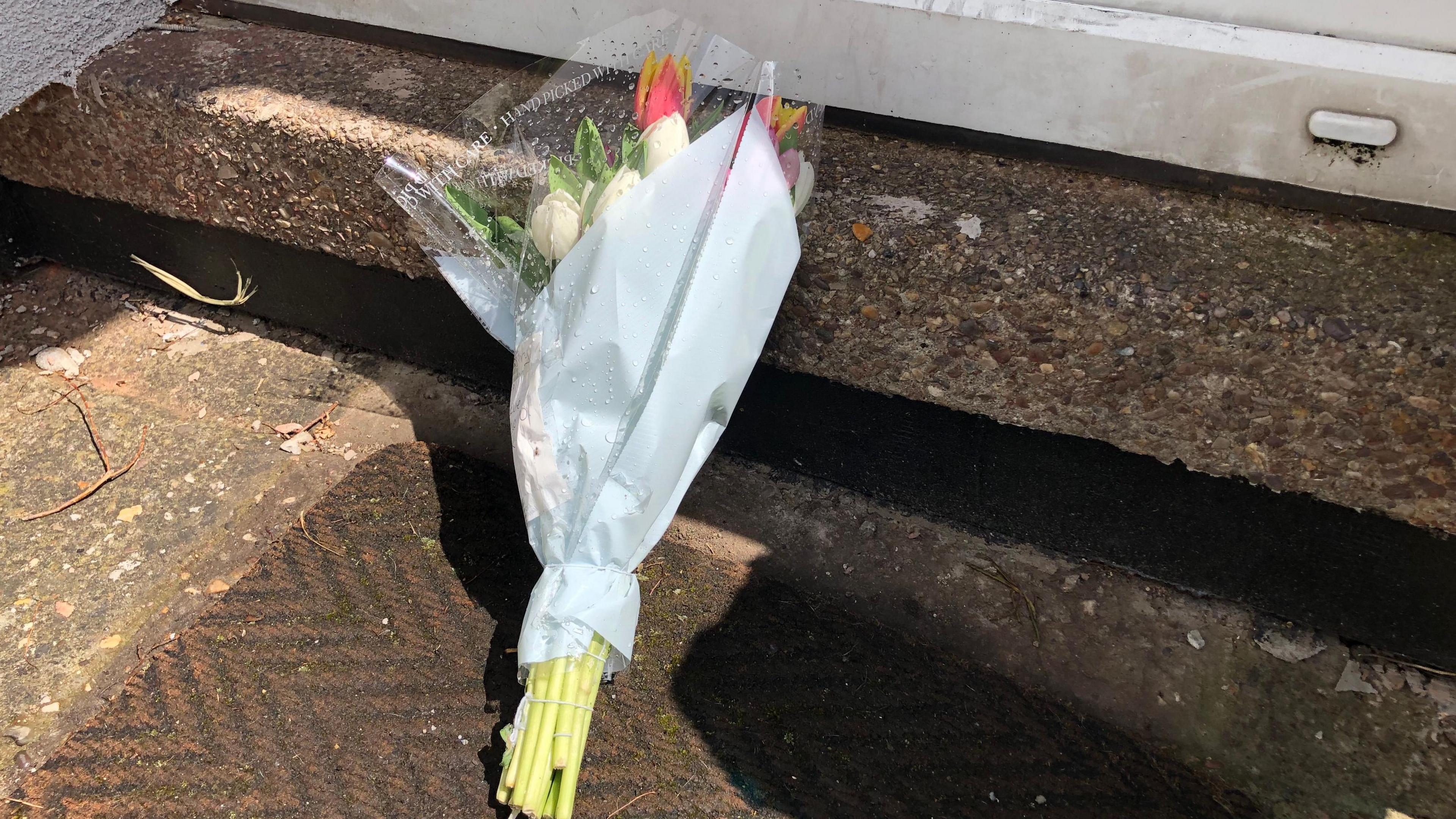 Floral tribute to woman who died in house fire, Bakersfield