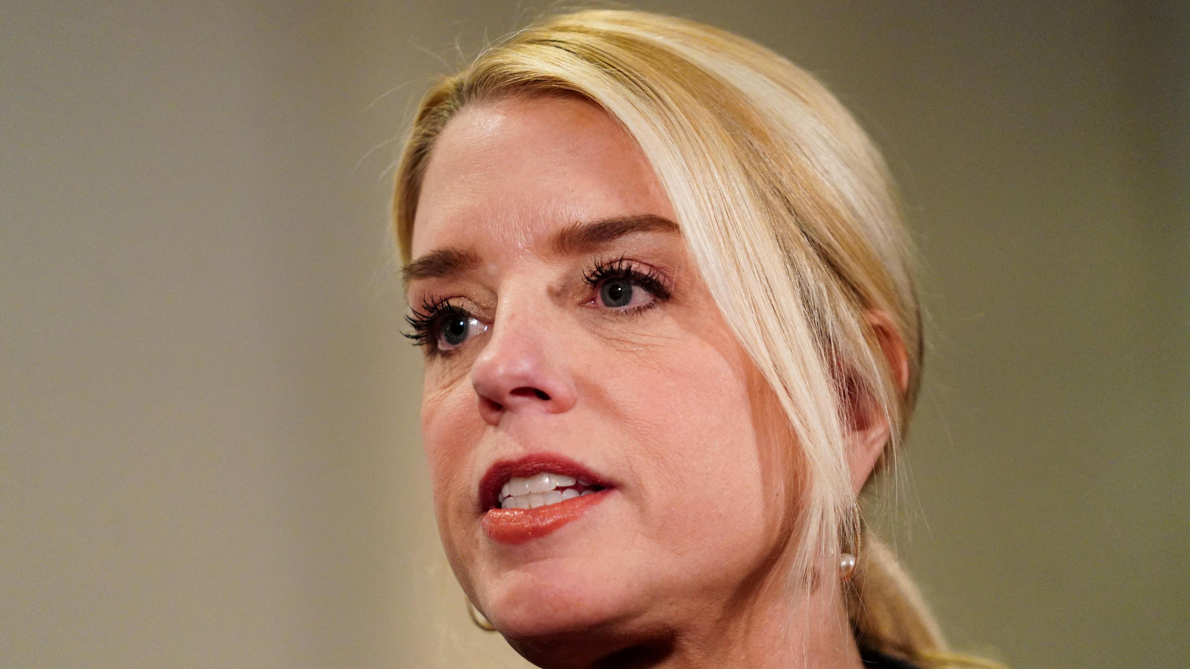 Attorney General Pam Bondi speaks to the media following a closed-door briefing. She has blonde hair.