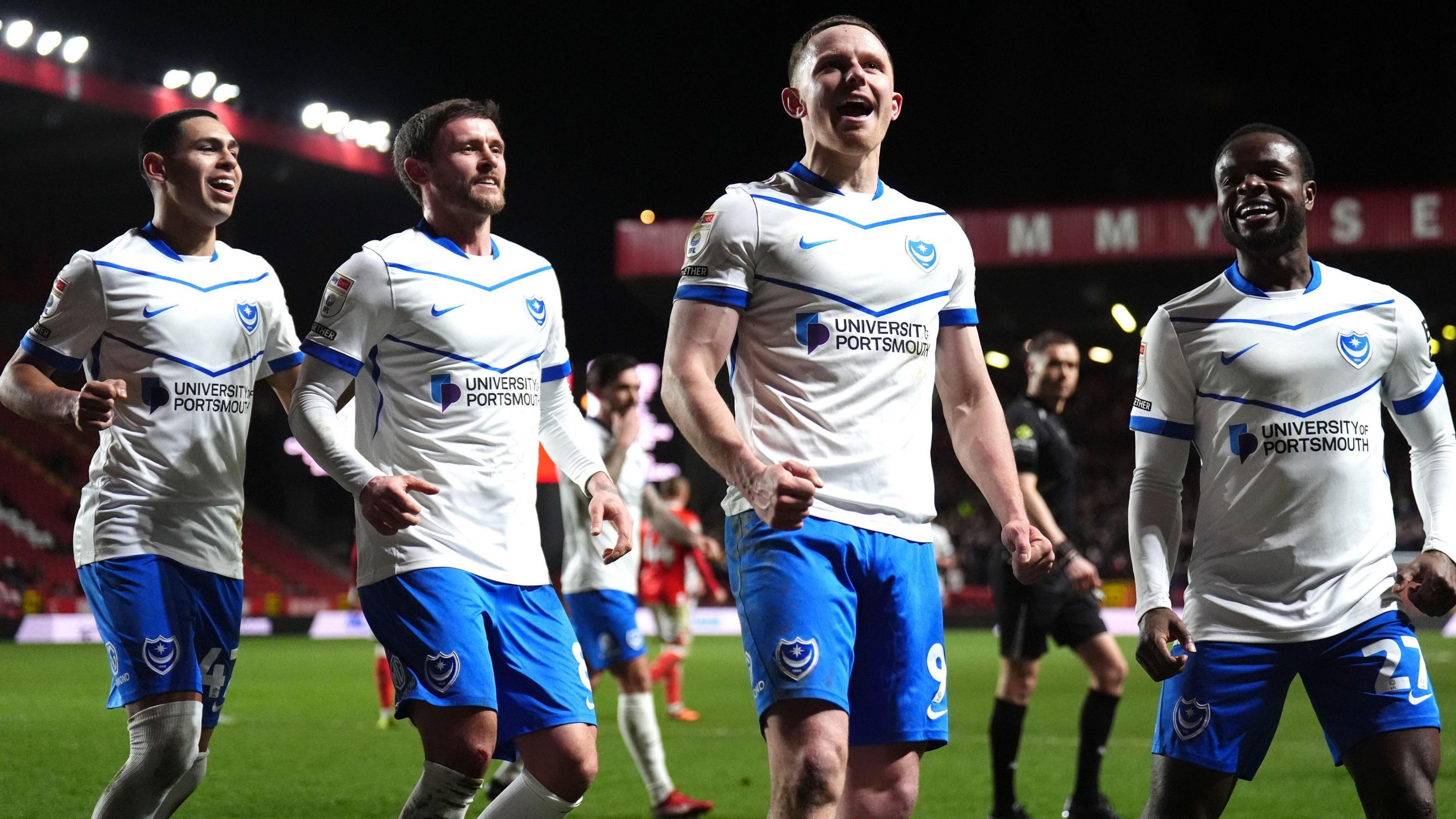 Portsmouth players celebrate Colby Bishop's penalty to make it 2-0 in the 3-1 over Charlton