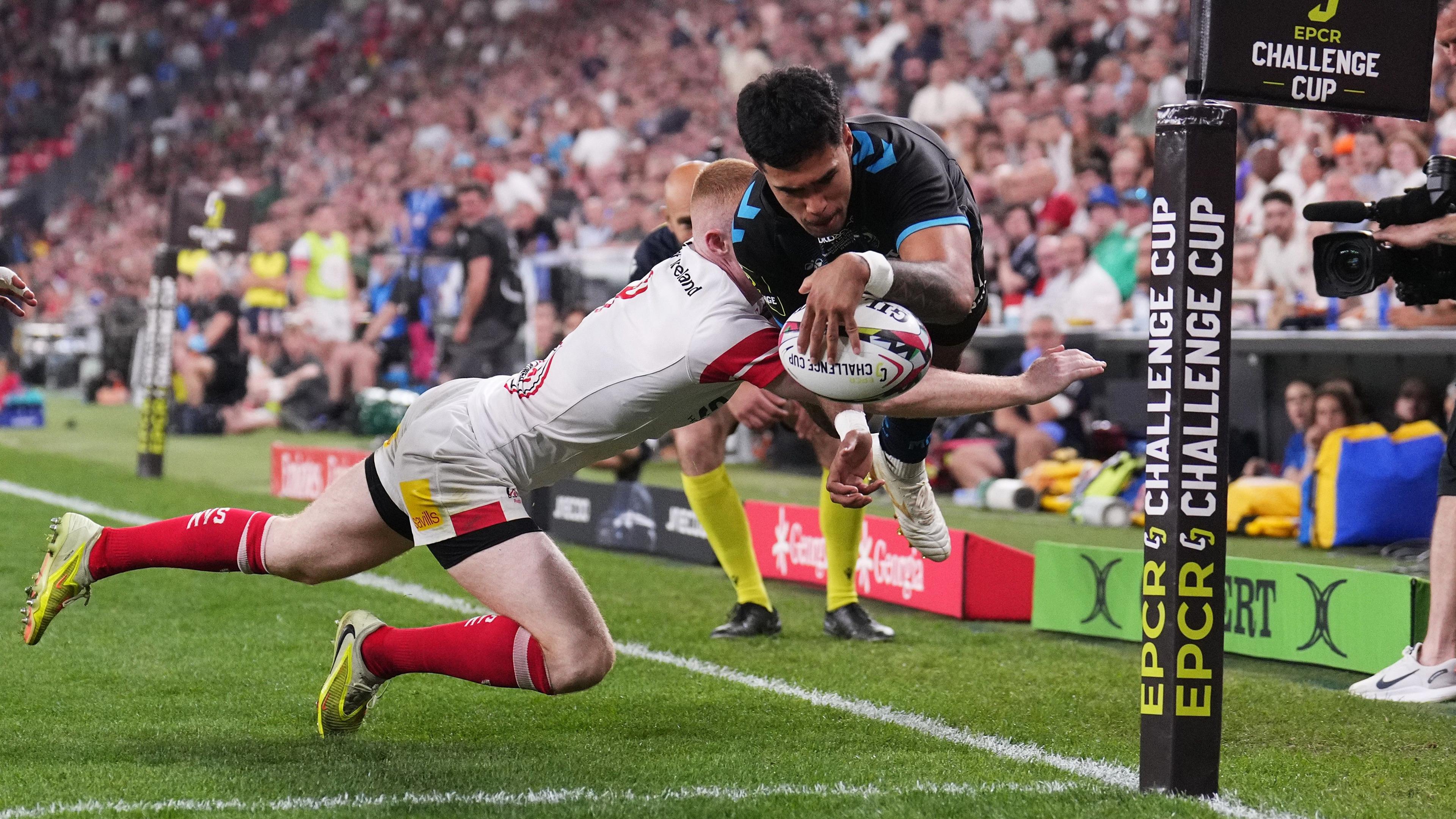Donovan Taofifenua drives over to score
