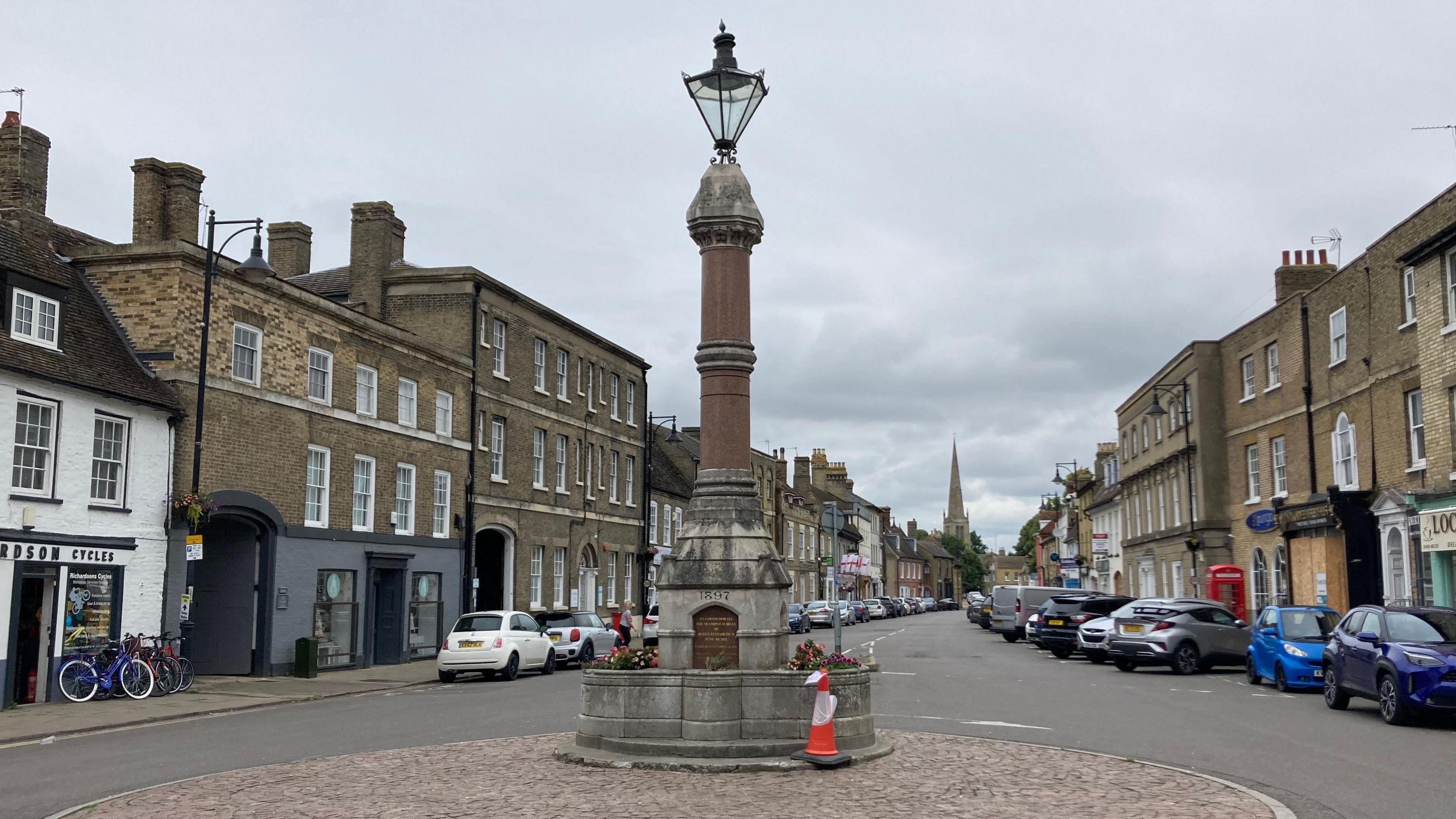 St Ives memorial jubilee statue in the middle, surrounded by rows of shops