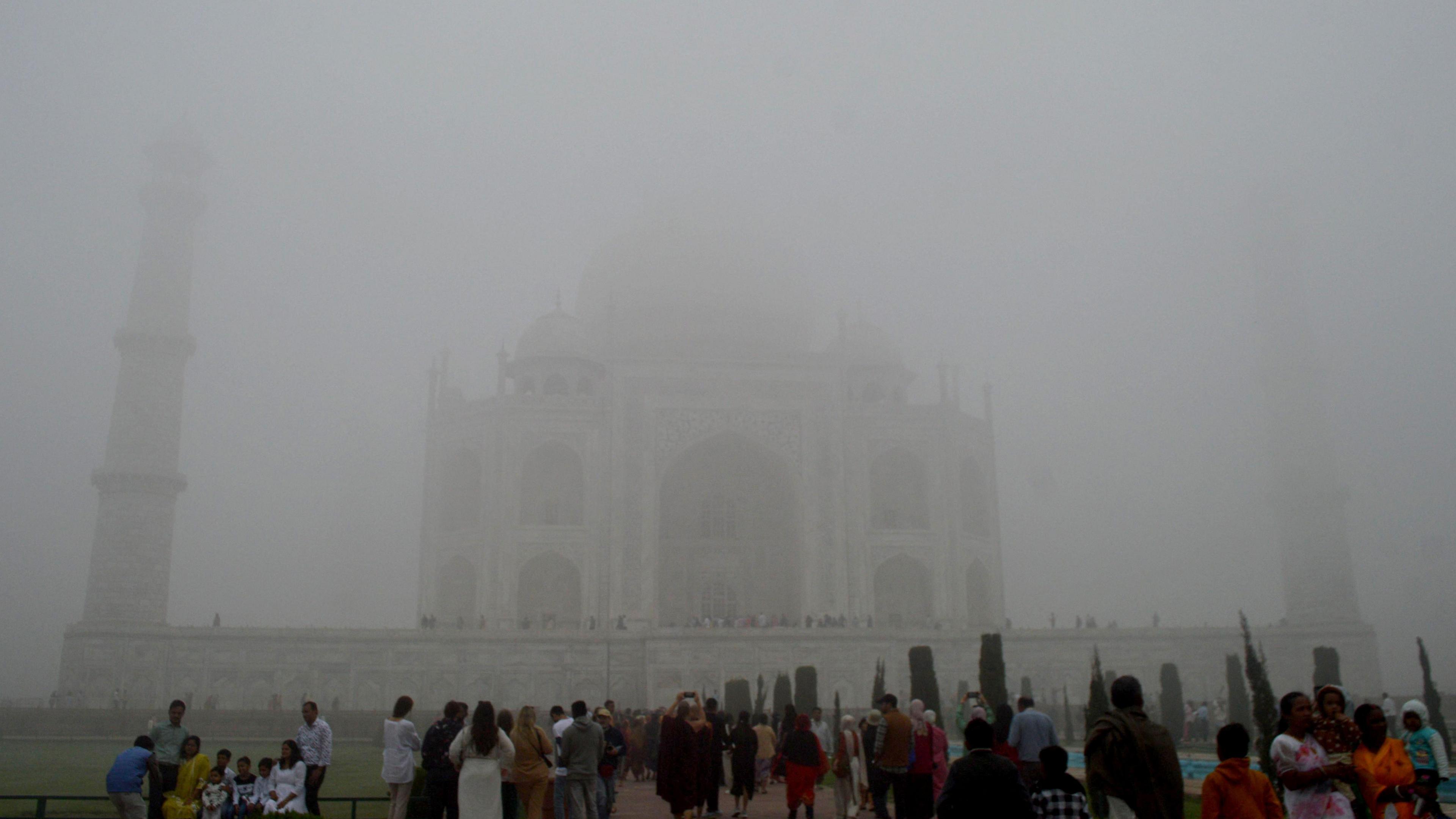 India's most popular tourist destination the Taj Mahal was hidden behind a cloud of smog on Thursday. 