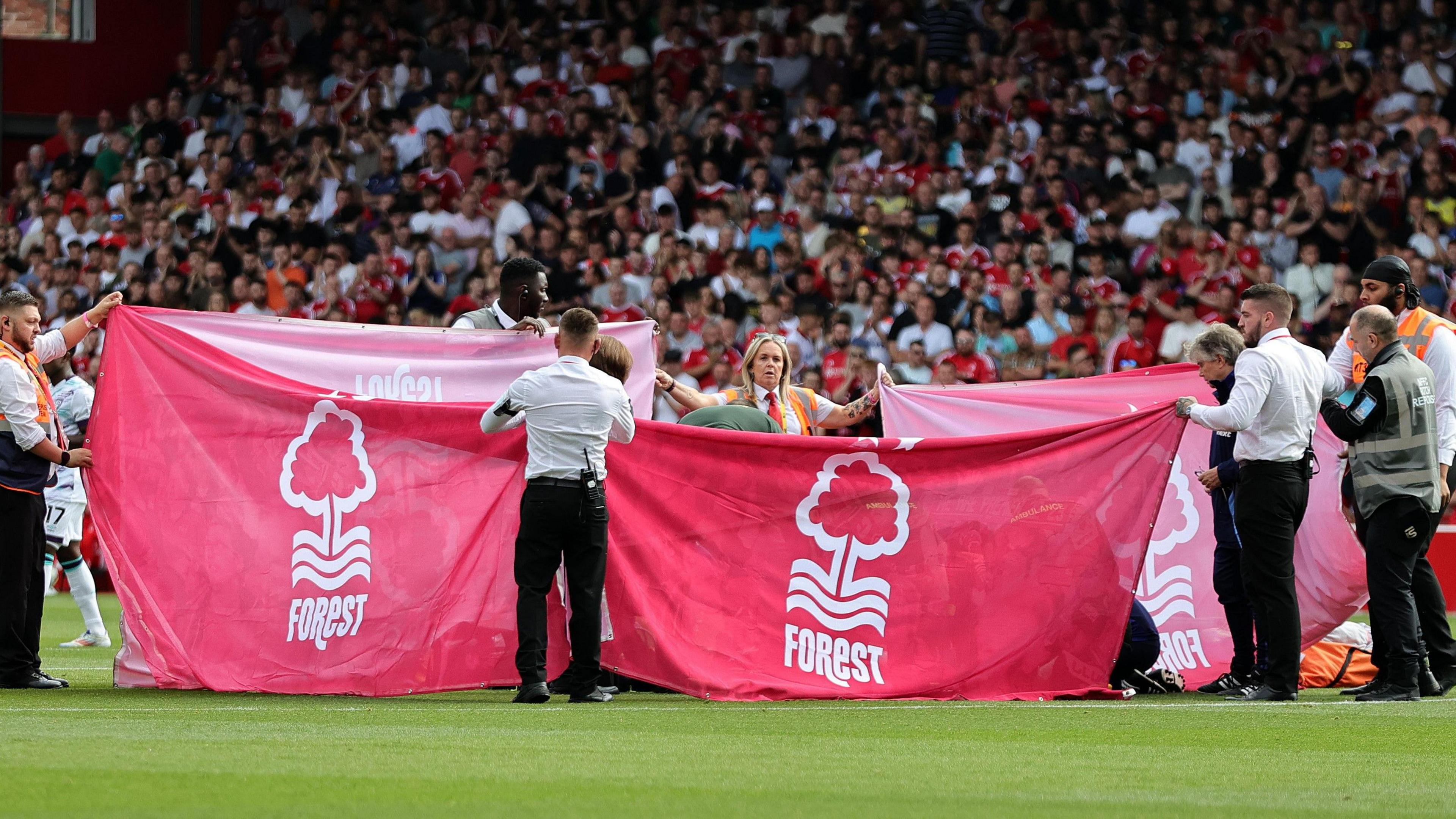 Forest's Danilo is shielded from view as he receives treatment