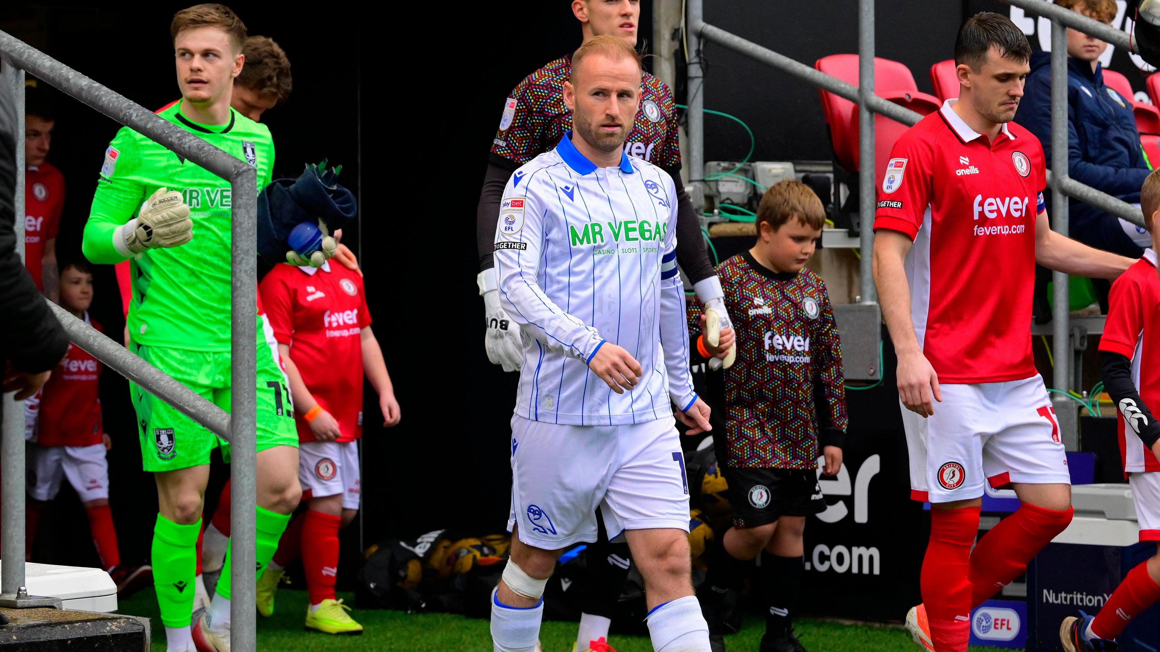 Barry Bannan (centre) walks out of the tunnel at Ashton Gate before kick-off in their game against Bristol City