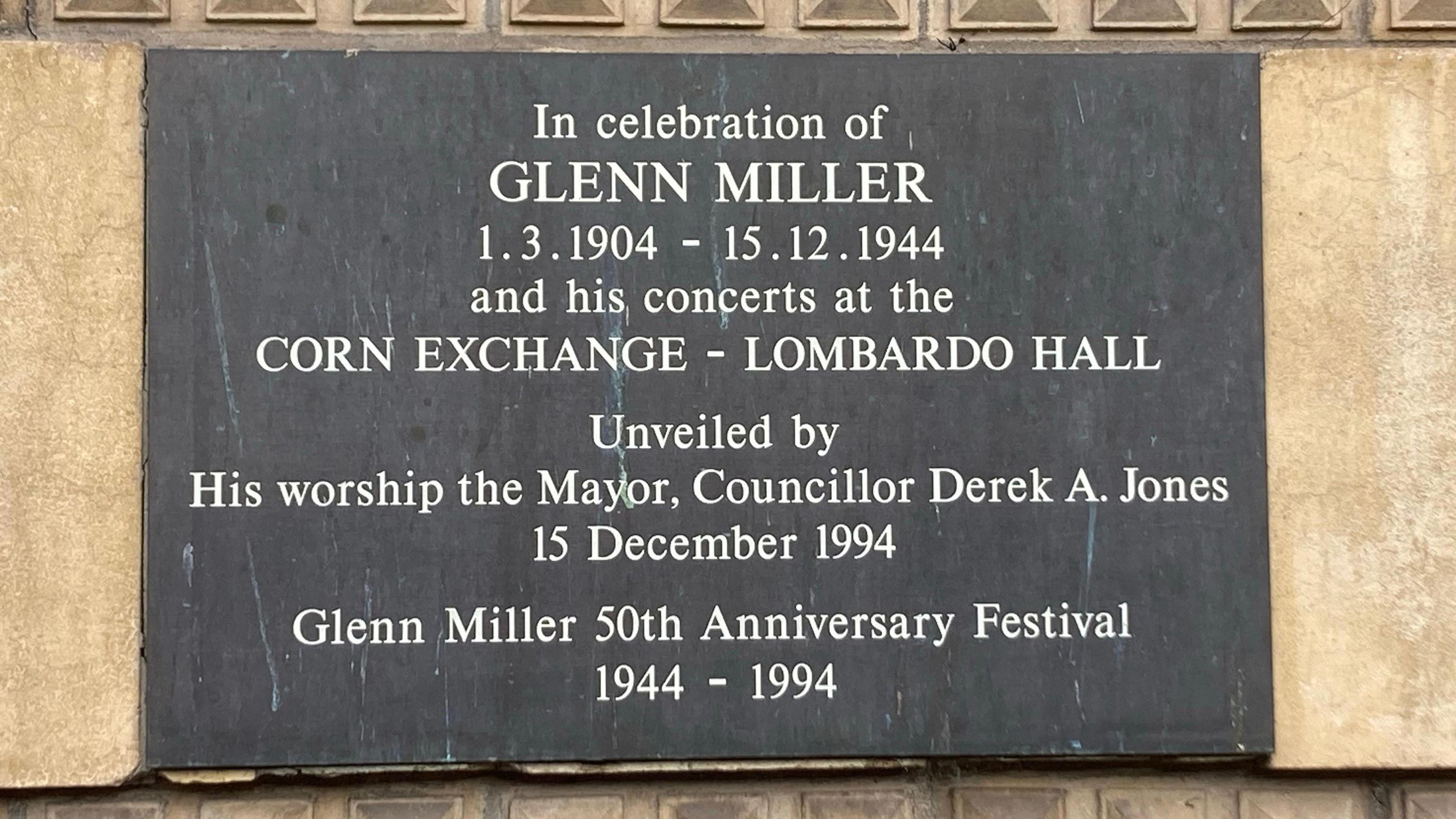 Glenn Miller plaque- a grey slate with writing in white