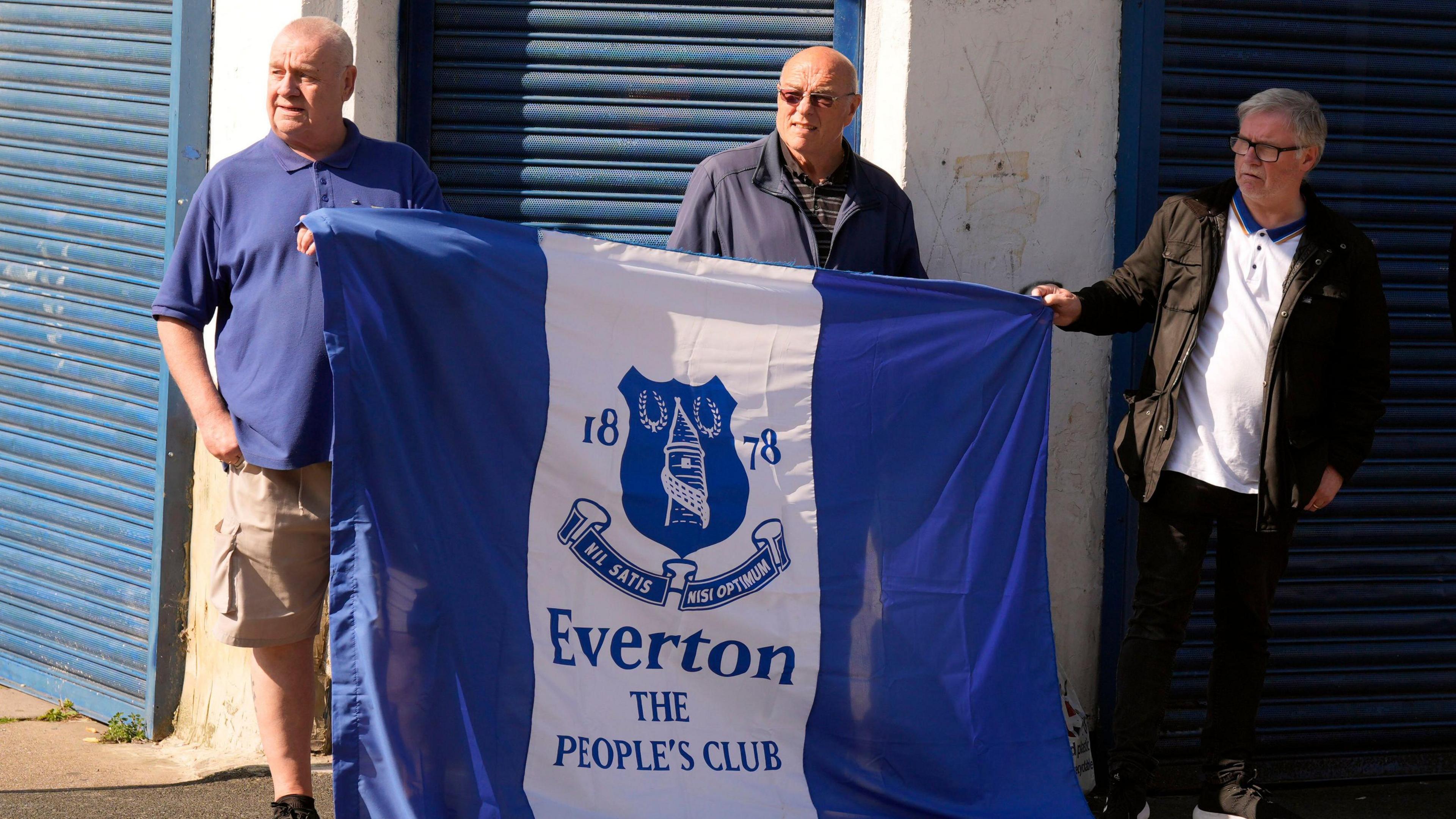 Everton fans outside the Church of St Luke, Liverpool