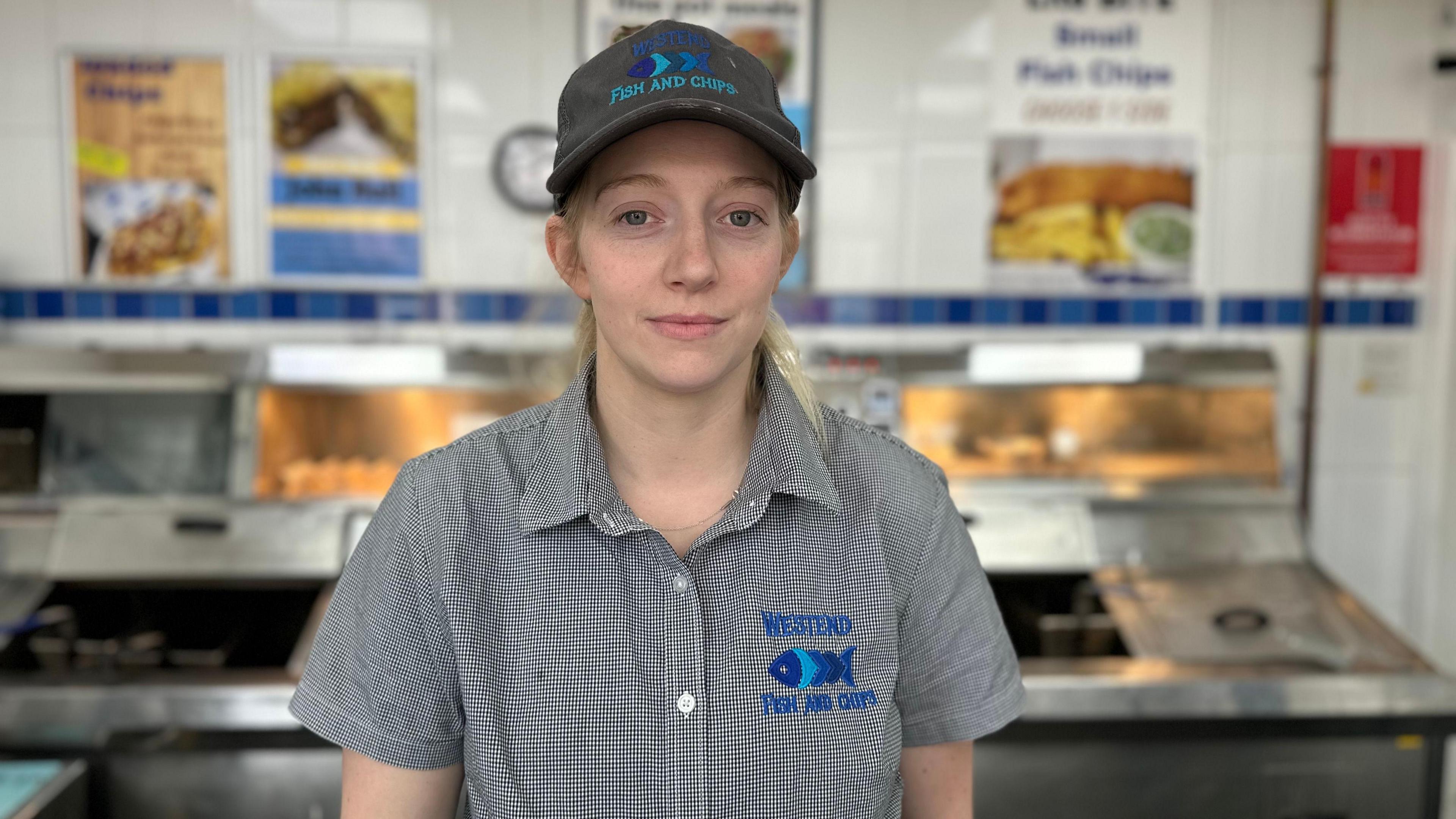 Deryn Regan looking at the camera in West End Fish & Chips shop 