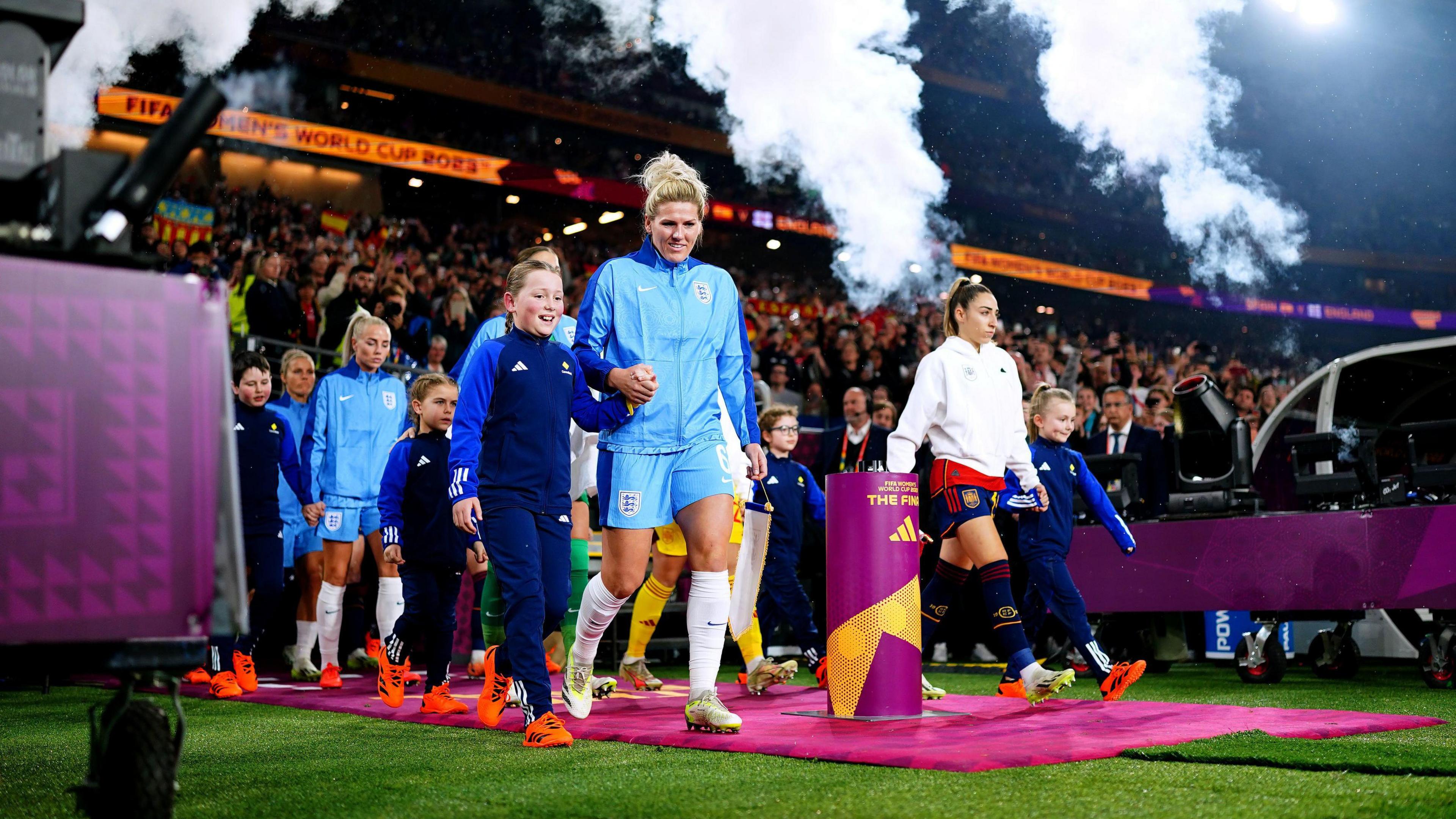 England's Millie Bright leads her team out ahead of the FIFA Women's World Cup final match at Stadium Australia, Sydney, 20 August 2023