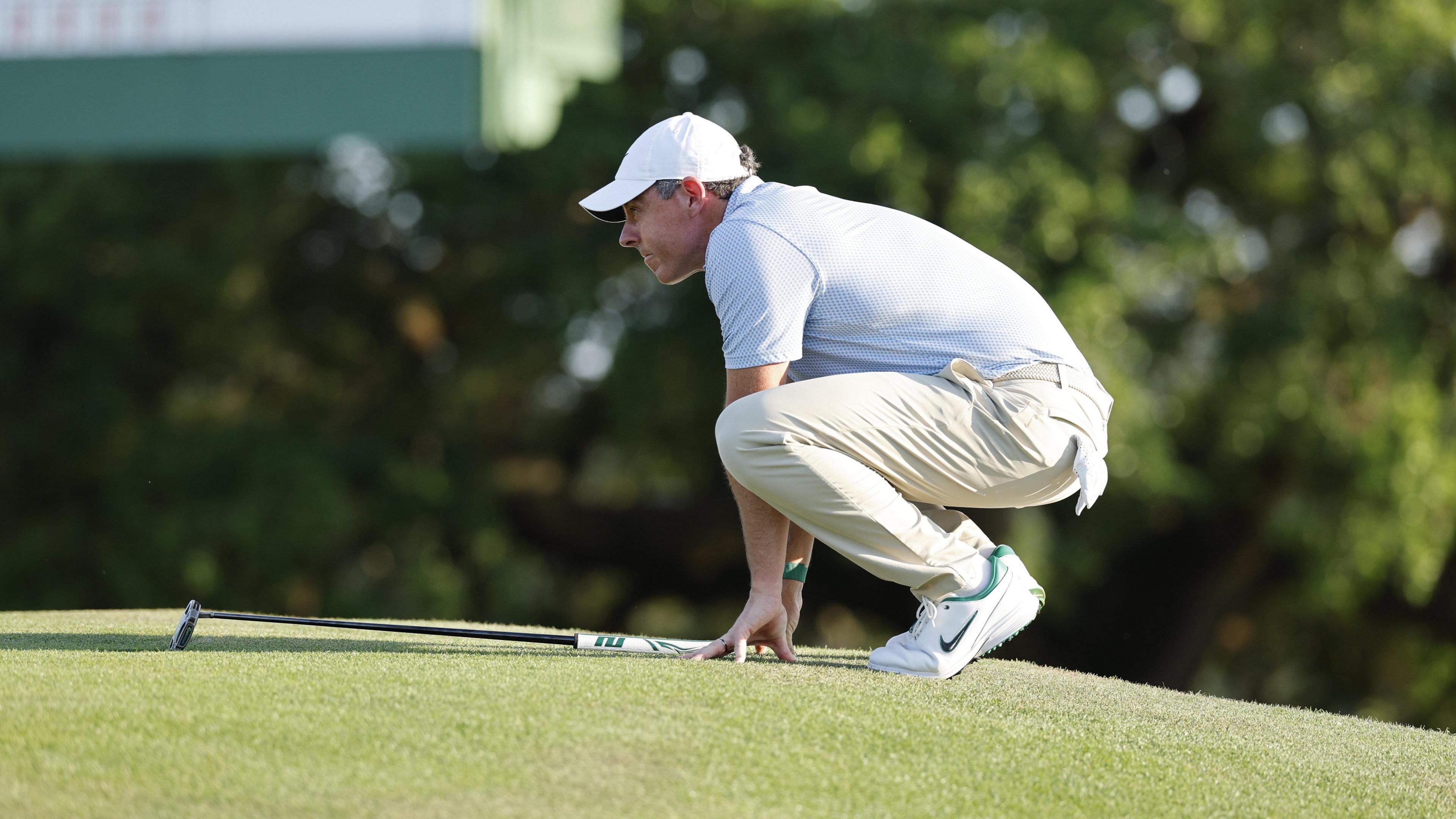 Rory McIlroy of Northern Ireland before his final putt on the 18th green in Round 4 of the 2026 Masters.